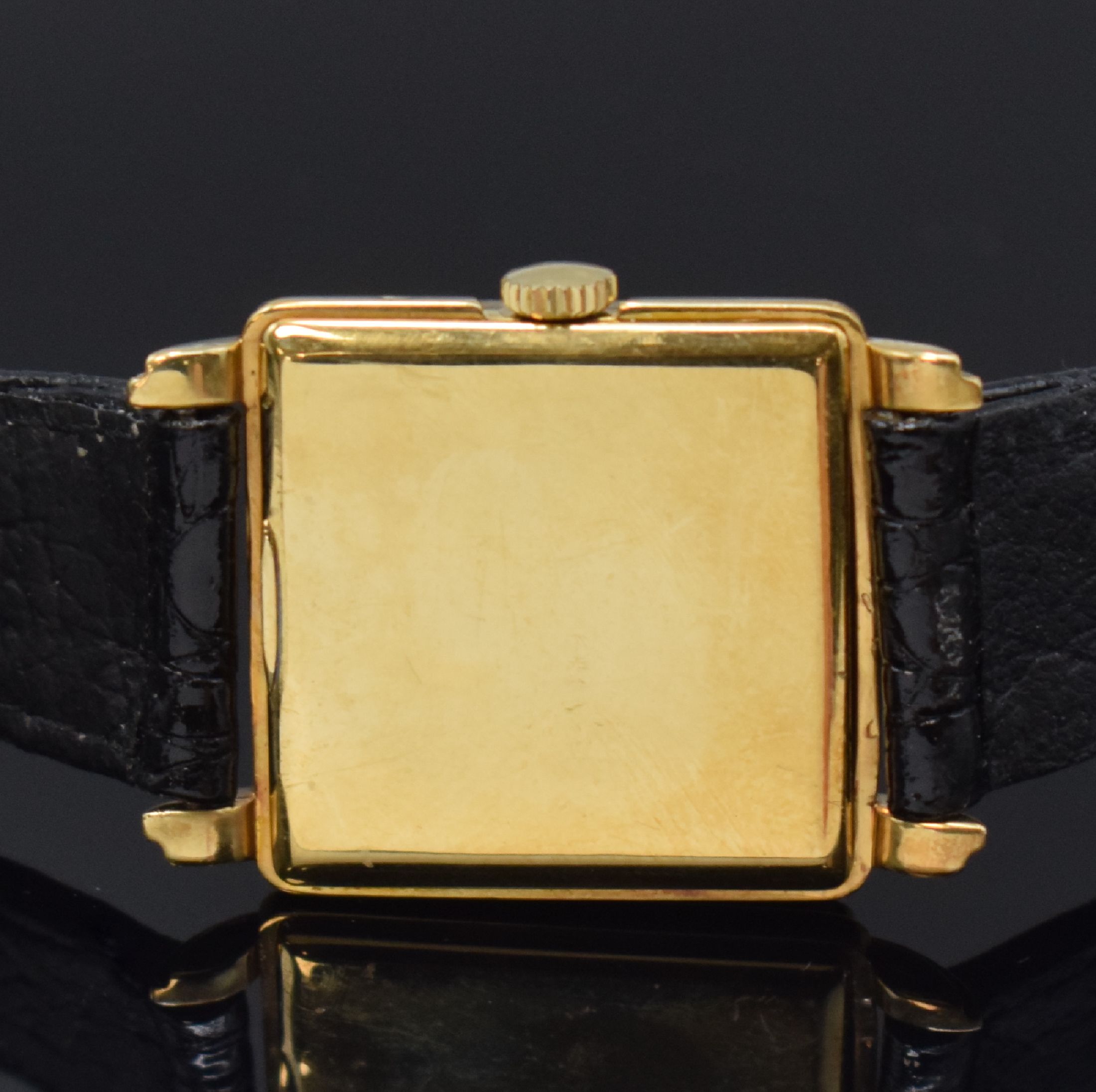Detail d: IWC viereckige Armbanduhr in GG 750/000, Schweiz um 1957, Handaufzug, aufgedr. Boden l. dell., rest. silb. Zifferbl. fl., gold. Std.-Ind., gold. ...