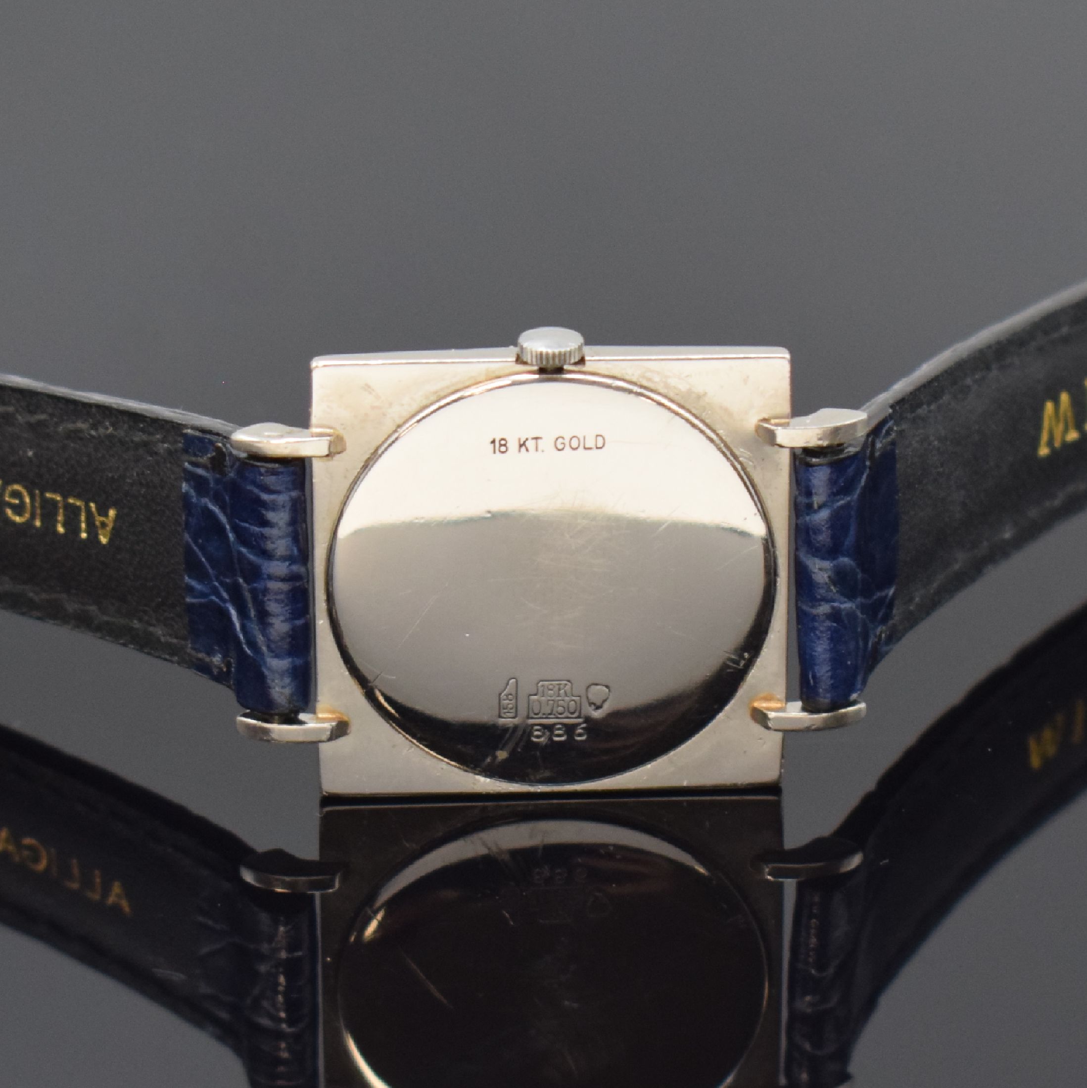Detail c: JULES JÜRGENSEN Armbanduhr in WG 750/000, Schweiz 1960er Jahre, Handaufzug, strukt. Geh., Boden aufgedr., blaues Zifferbl. mit Freimaurersymbolik ...