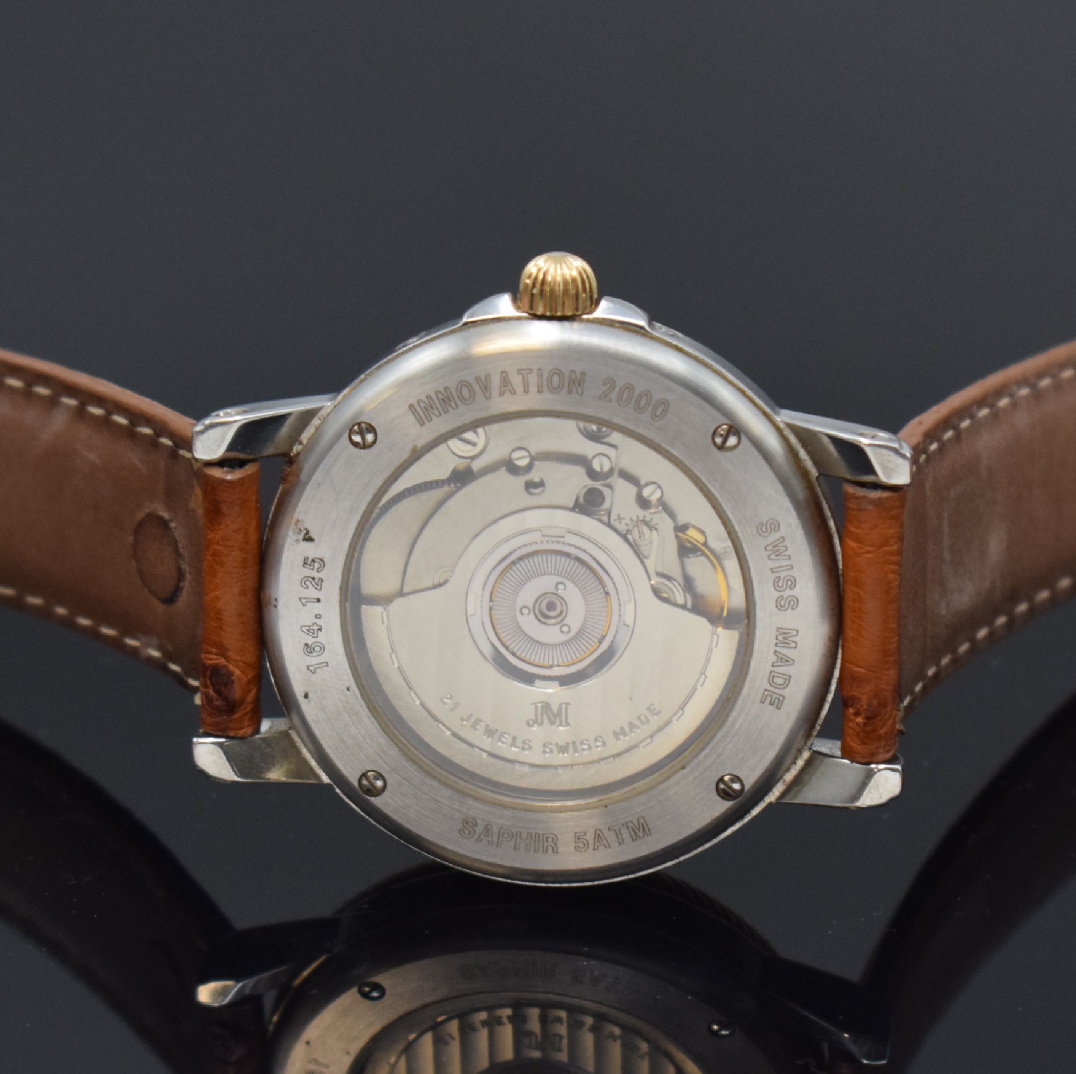 Detail d: JEAN MARCEL Innovation 2000 Herrenarmbanduhr mit Vollkalender in Stahl/Gold, Schweiz um 1997, Automatik, beids. vergl. Geh., Boden 4- fach verschr., ...