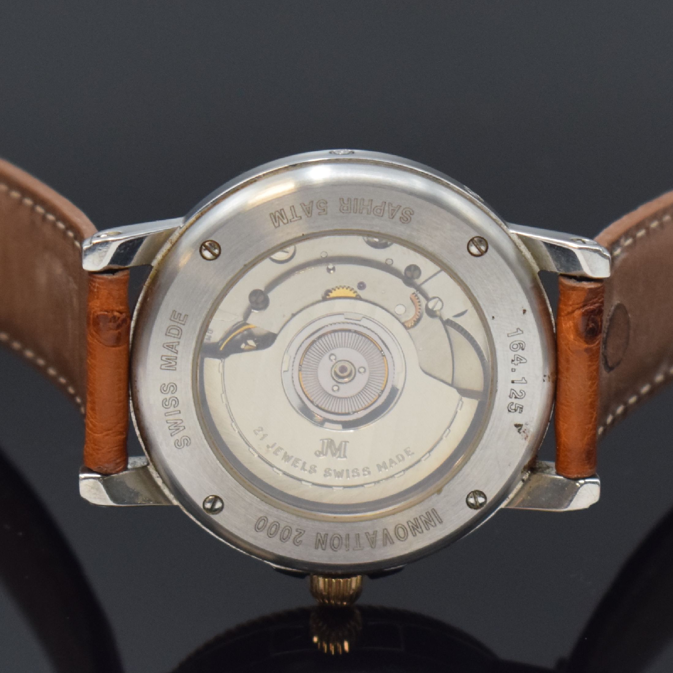 Detail e: JEAN MARCEL Innovation 2000 Herrenarmbanduhr mit Vollkalender in Stahl/Gold, Schweiz um 1997, Automatik, beids. vergl. Geh., Boden 4- fach verschr., ...