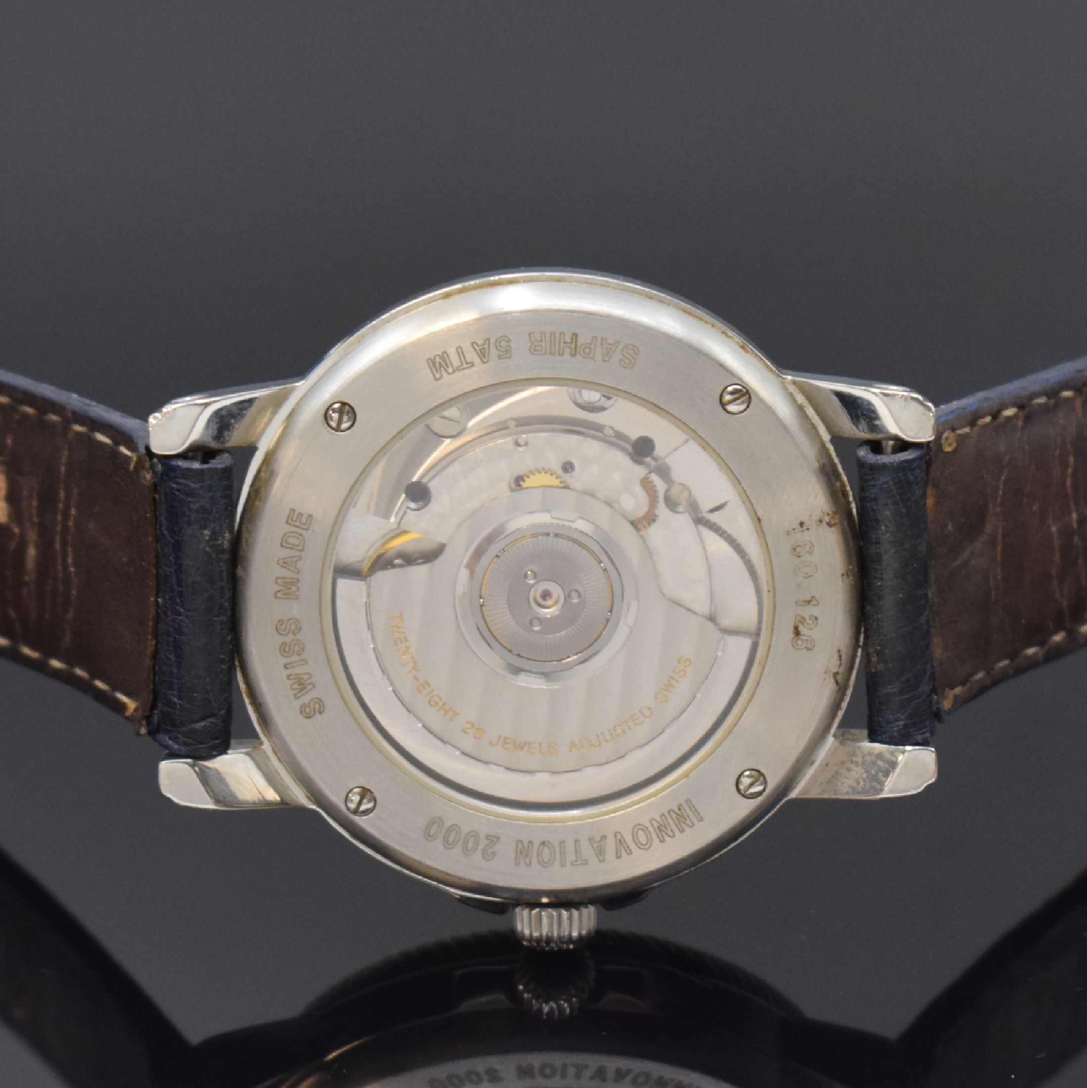 Detail e: JEAN Marcel Herrenarmbanduhr Innovation 2000 in Stahl, Schweiz um 2003, Automatik, beids. vergl. Geh., Boden 4-fach verschr., orig. Lederband (zu ...
