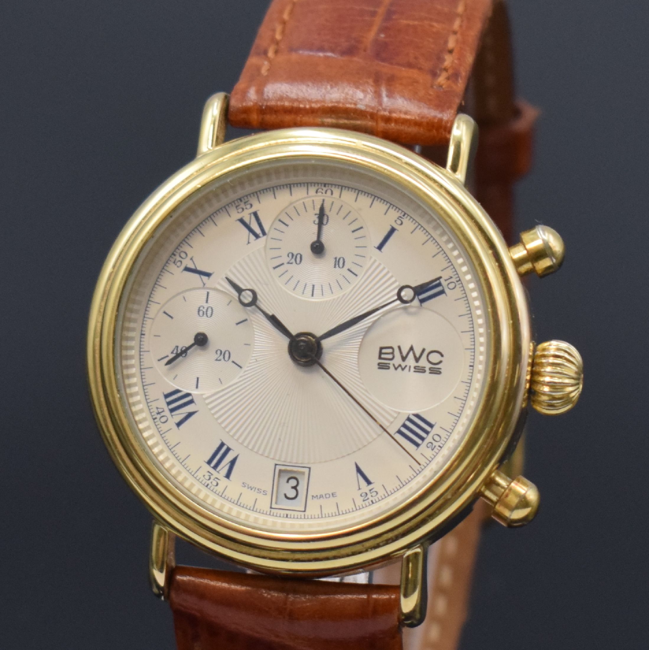 Detail a: BWC vergoldete Armbanduhr mit Chronograph, Schweiz um 1985, Handaufzug, Stahlboden gedr., Lederband m. orig. Dornschl., silb. Zifferbl. m. röm. ...