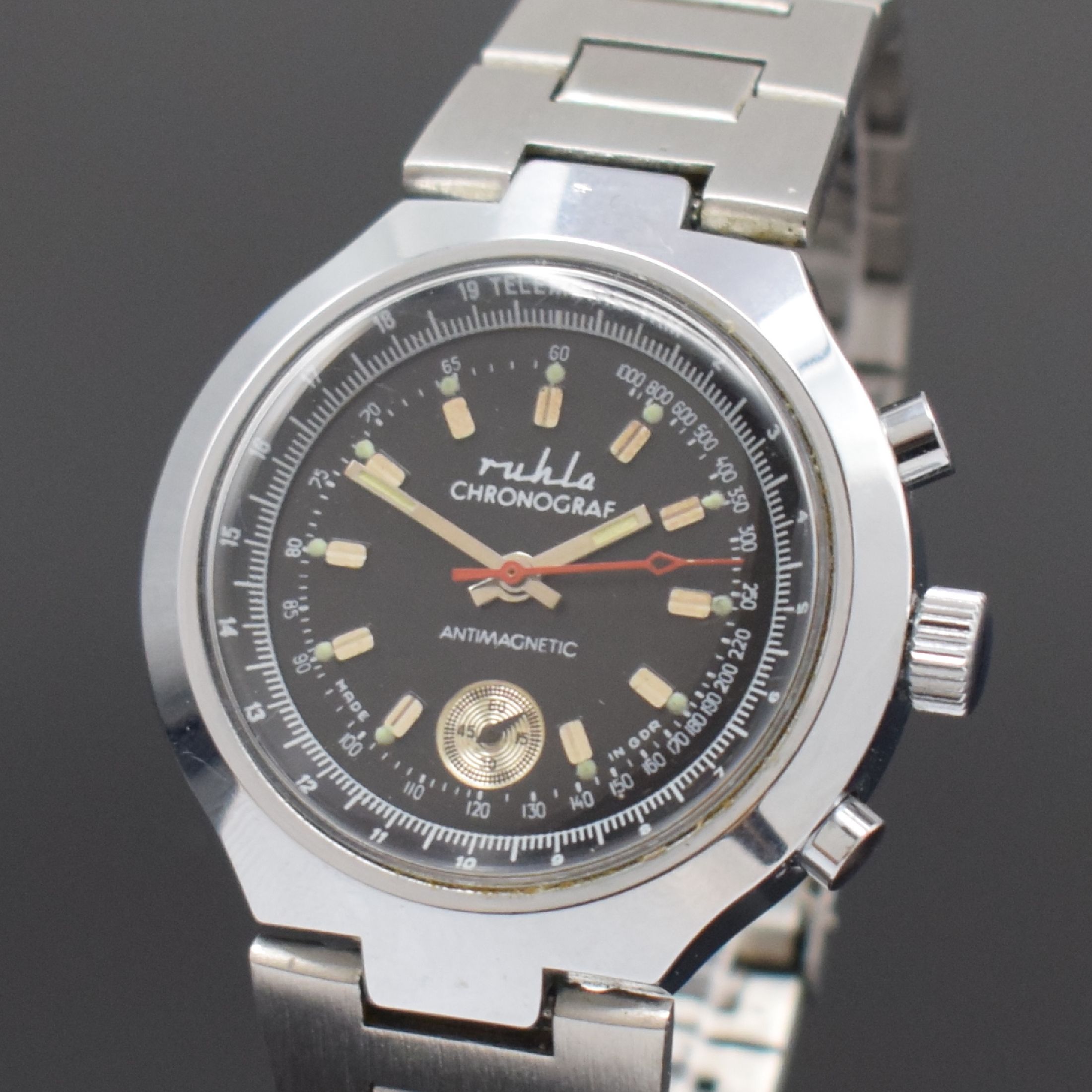 Detail a: RUHLA verchromter Armbandchronograph, GDR um 1975, Handaufzug, neutr. Gliederband, Boden verschr., schwarzes Zifferbl. m. silb. Std.-Ind., kl. Sek. ...