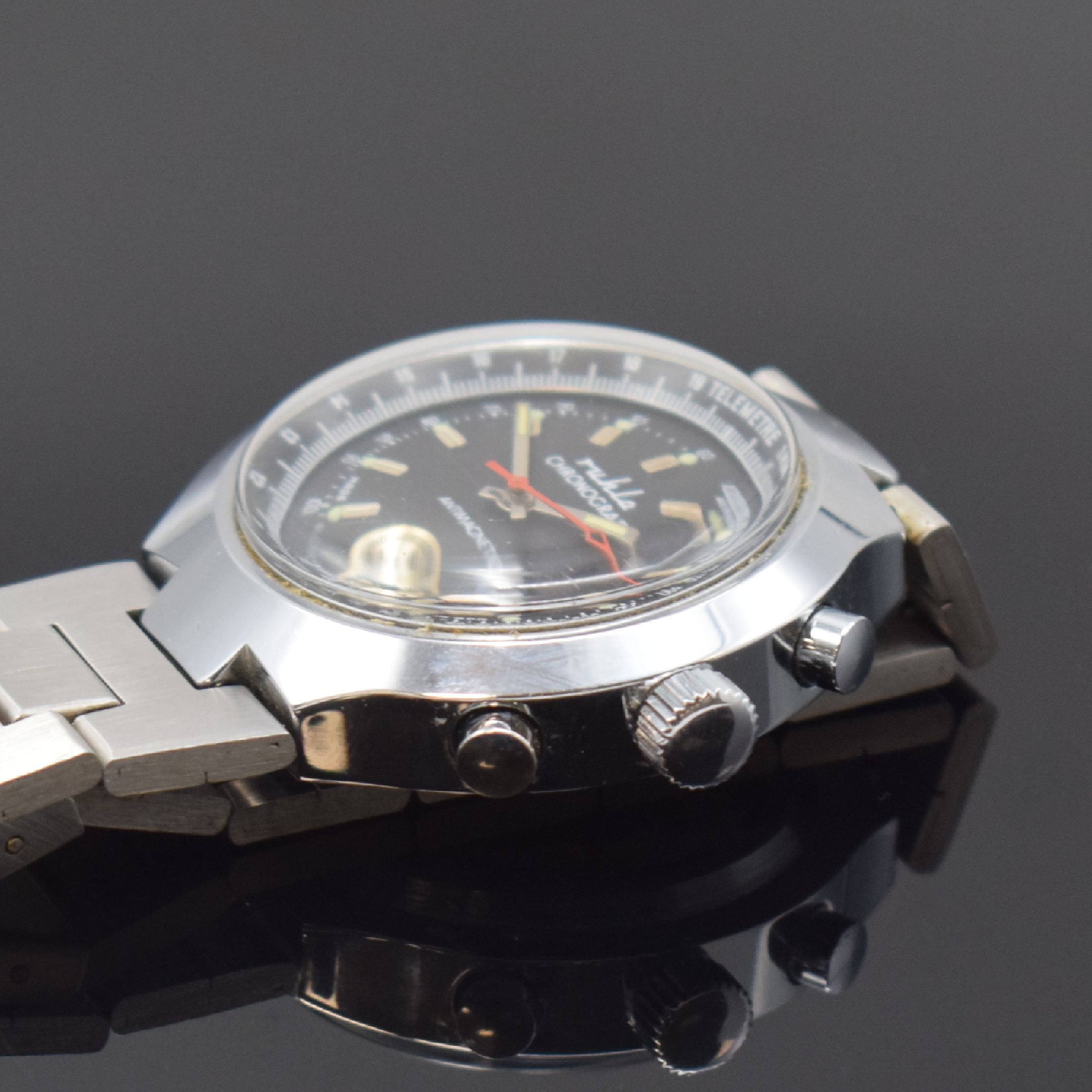 Detail b: RUHLA verchromter Armbandchronograph, GDR um 1975, Handaufzug, neutr. Gliederband, Boden verschr., schwarzes Zifferbl. m. silb. Std.-Ind., kl. Sek. ...