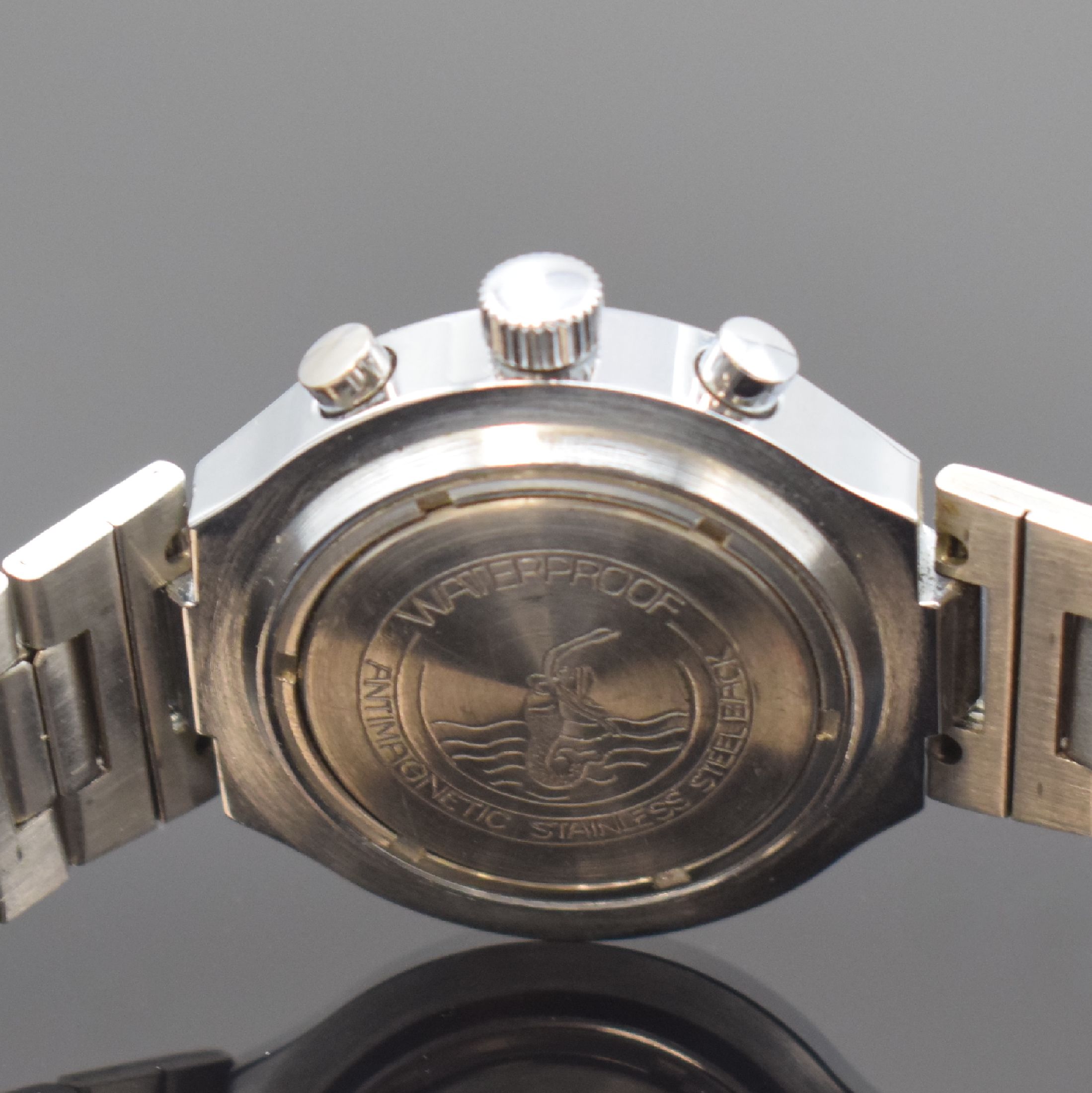 Detail c: RUHLA verchromter Armbandchronograph, GDR um 1975, Handaufzug, neutr. Gliederband, Boden verschr., schwarzes Zifferbl. m. silb. Std.-Ind., kl. Sek. ...