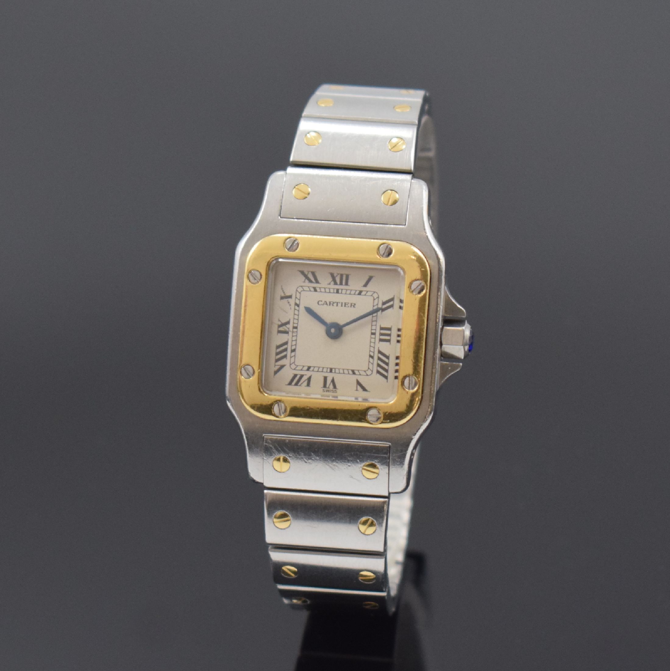 CARTIER Santos Damenarmbanduhr in Stahl/Gold Referenz 1057930, Schweiz um 1995, quarz, orig. Gliederband m. Faltschl., Boden 8-fach verschr., ...