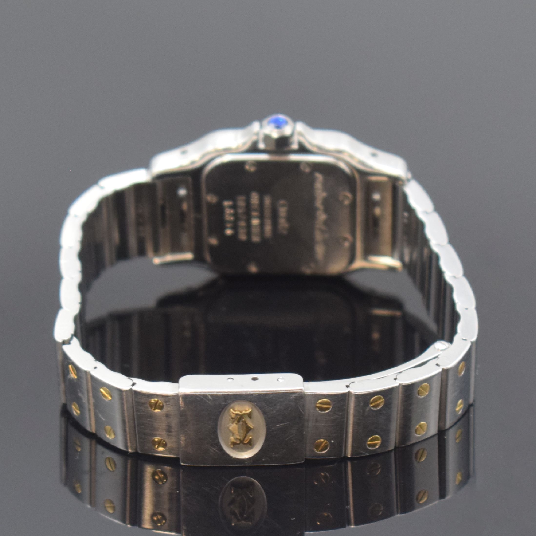 Detail b: CARTIER Santos Damenarmbanduhr in Stahl/Gold Referenz 1057930, Schweiz um 1995, quarz, orig. Gliederband m. Faltschl., Boden 8-fach verschr., ...