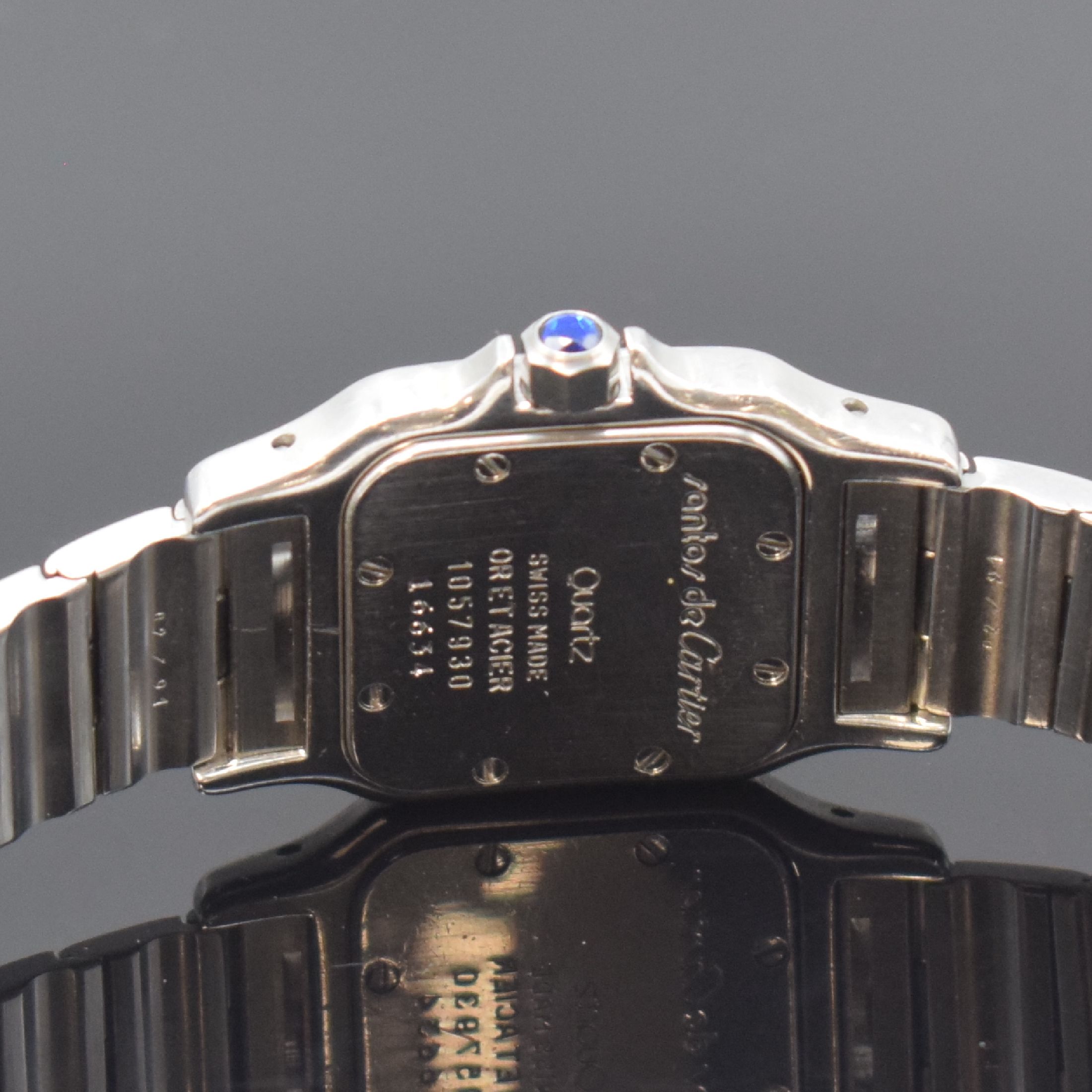 Detail d: CARTIER Santos Damenarmbanduhr in Stahl/Gold Referenz 1057930, Schweiz um 1995, quarz, orig. Gliederband m. Faltschl., Boden 8-fach verschr., ...