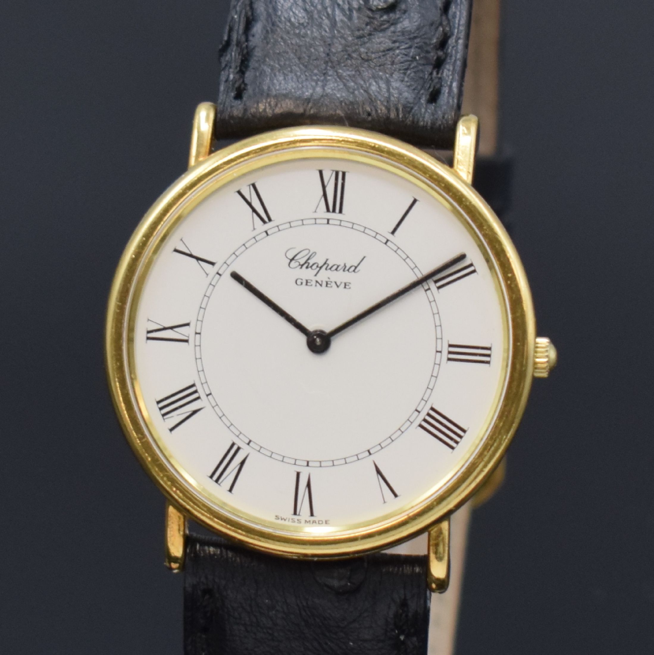 Detail a: CHOPARD Armbanduhr in GG 750/000 Referenz 1160, Schweiz um 1980, Handaufzug, 2-teil. Geh., Boden aufgedr., emailfarb. Zifferbl. m. röm. Std., verg. ...
