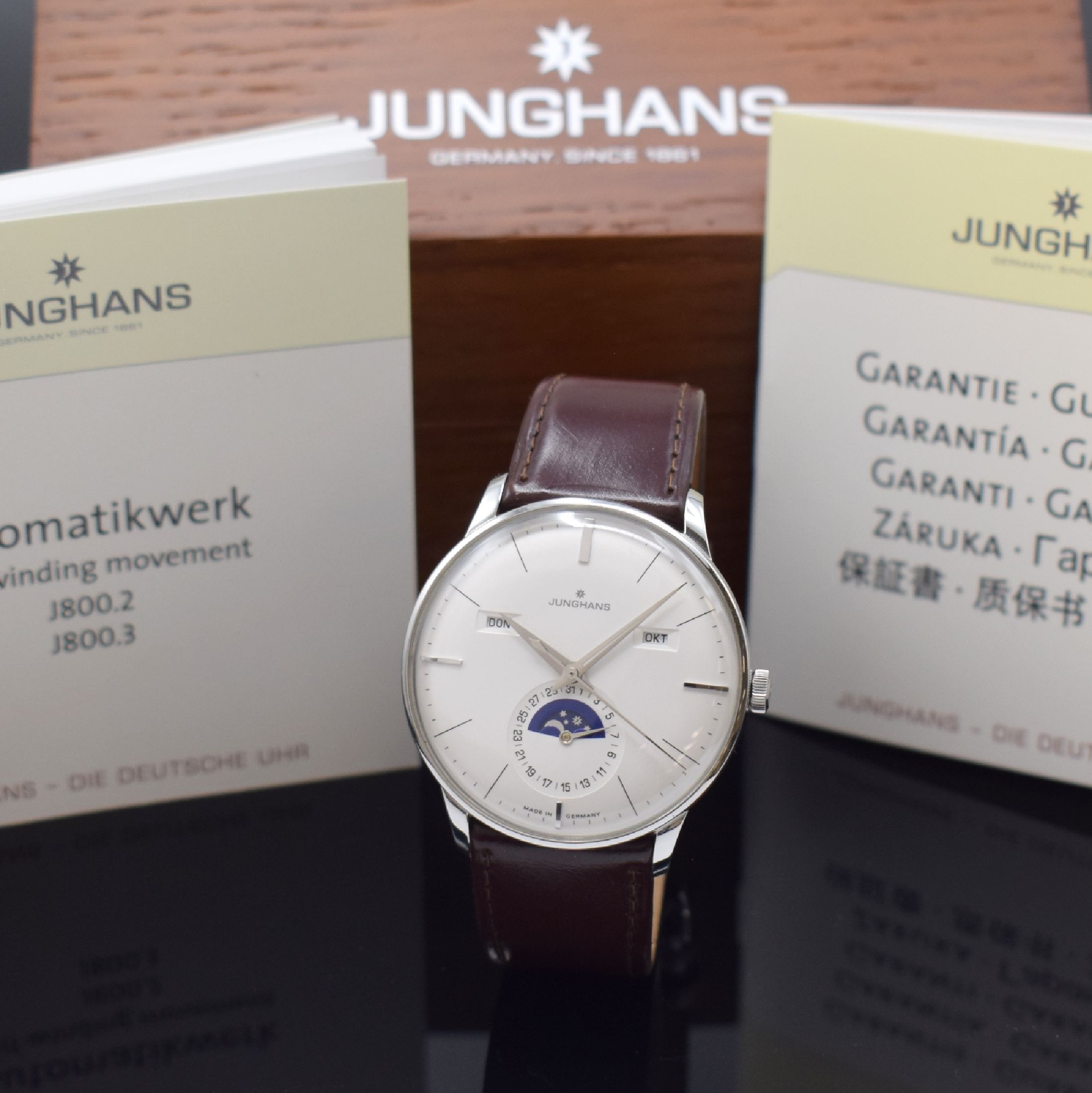 JUNGHANS Meister Kalender Herrenarmbanduhr Referenz 027/4200, Automatik, beids. vergl. Edelstahlgeh. inkl. orig. Lederband m. orig. Dornschl., Boden ...