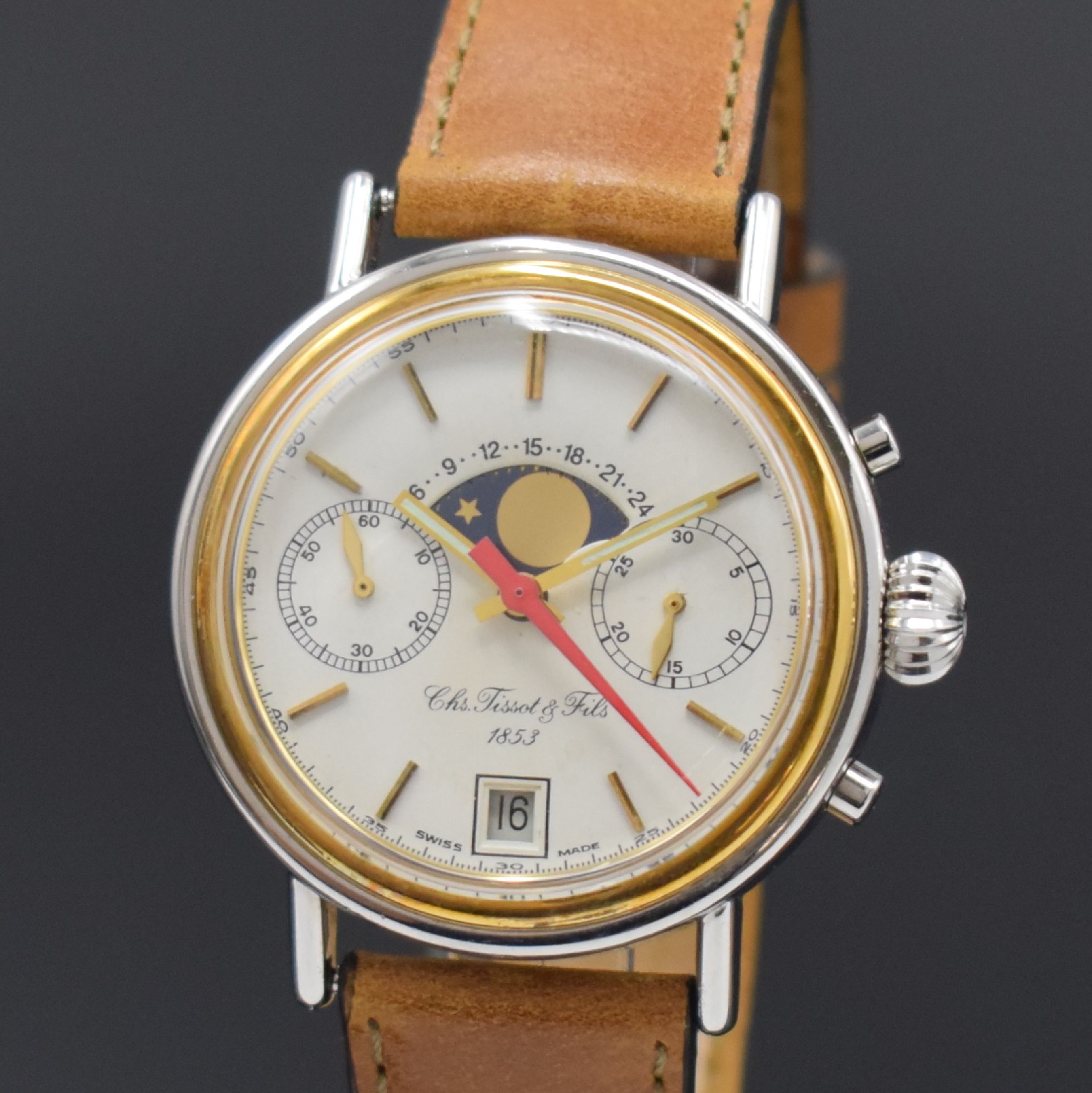 Detail a: TISSOT Herrenarmbanduhr mit Chronograph und Mondphase, Schweiz um 1985, Handaufzug, Stahlgeh., Boden gedr., verg. Lünette, silb. Zifferbl. m. ...