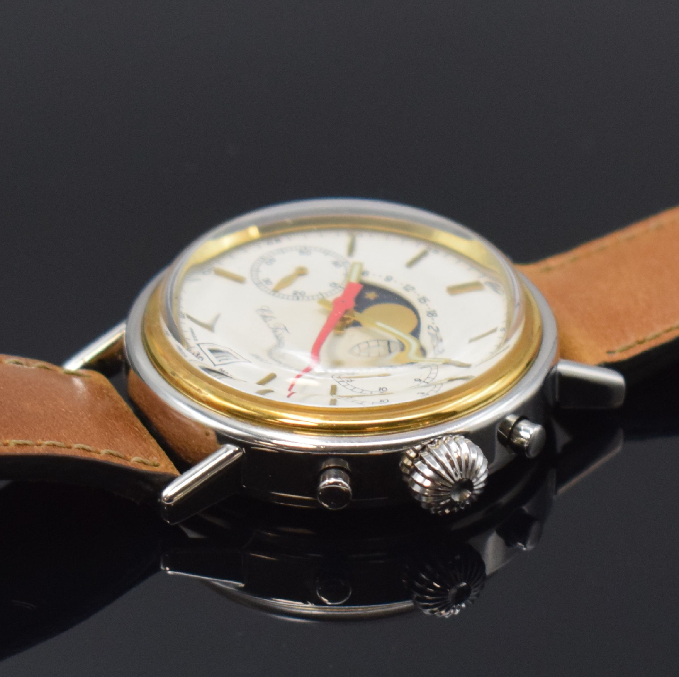 Detail b: TISSOT Herrenarmbanduhr mit Chronograph und Mondphase, Schweiz um 1985, Handaufzug, Stahlgeh., Boden gedr., verg. Lünette, silb. Zifferbl. m. ...