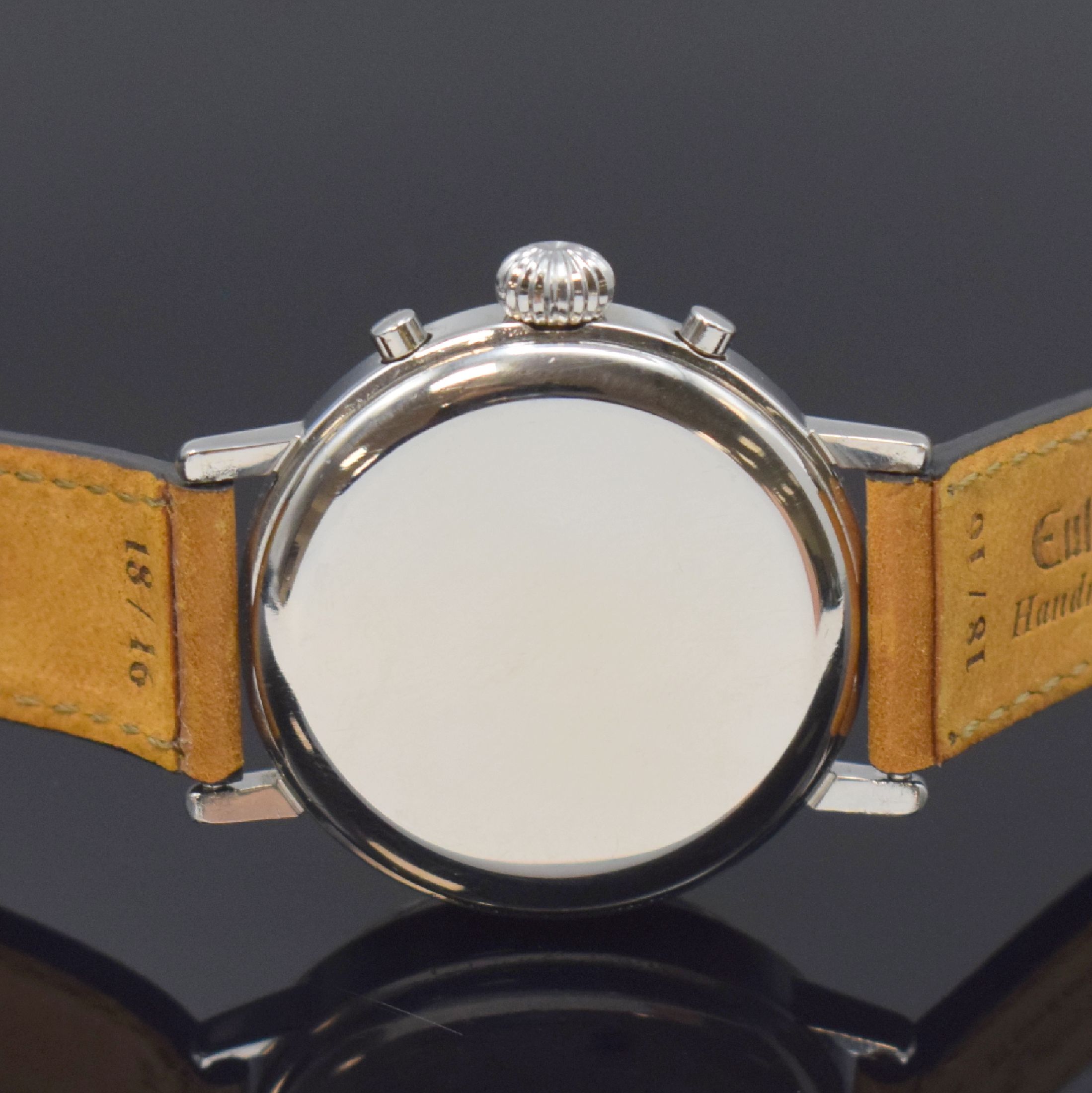 Detail d: TISSOT Herrenarmbanduhr mit Chronograph und Mondphase, Schweiz um 1985, Handaufzug, Stahlgeh., Boden gedr., verg. Lünette, silb. Zifferbl. m. ...