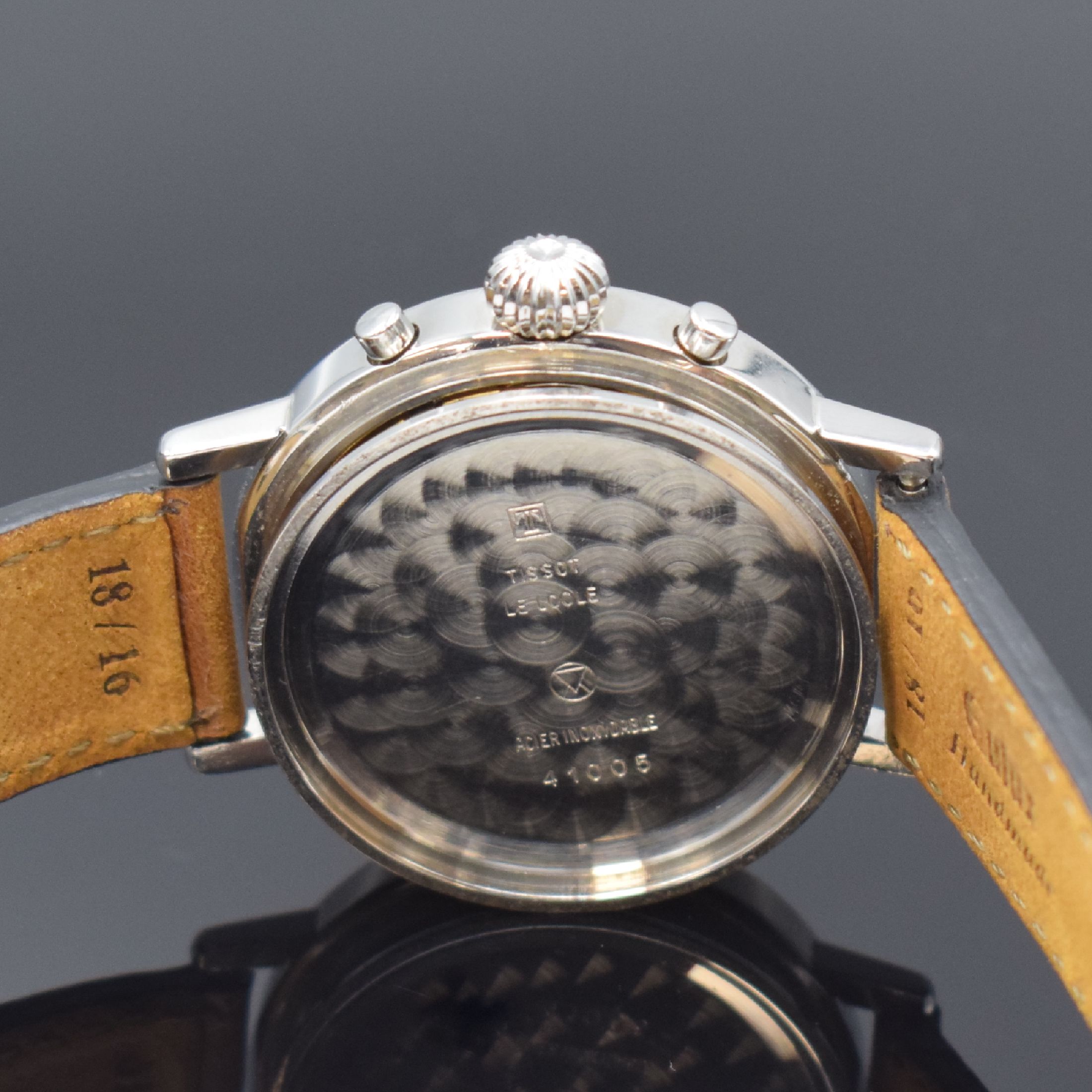 Detail f: TISSOT Herrenarmbanduhr mit Chronograph und Mondphase, Schweiz um 1985, Handaufzug, Stahlgeh., Boden gedr., verg. Lünette, silb. Zifferbl. m. ...