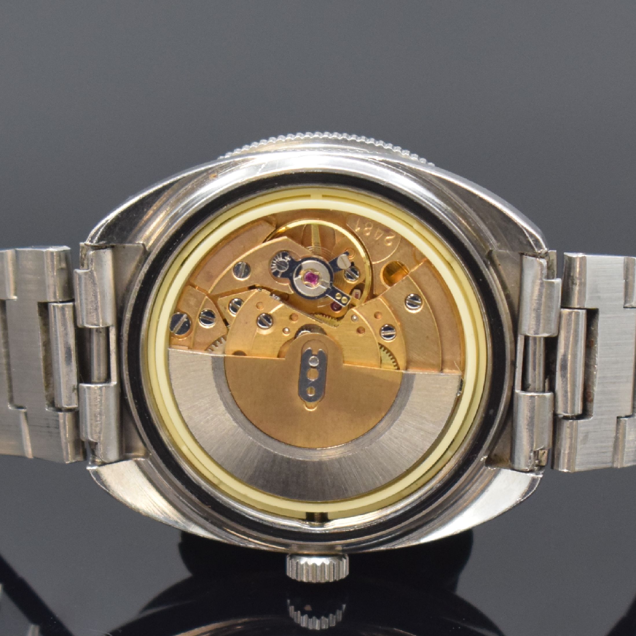 Detail f: TISSOT Navigator Herrenarmbanduhr, Schweiz um 1975, Automatik, Edelstahlgeh., Boden geschr., orig. Gliederband m. Faltschl., eins. drehb. Lünette, ...