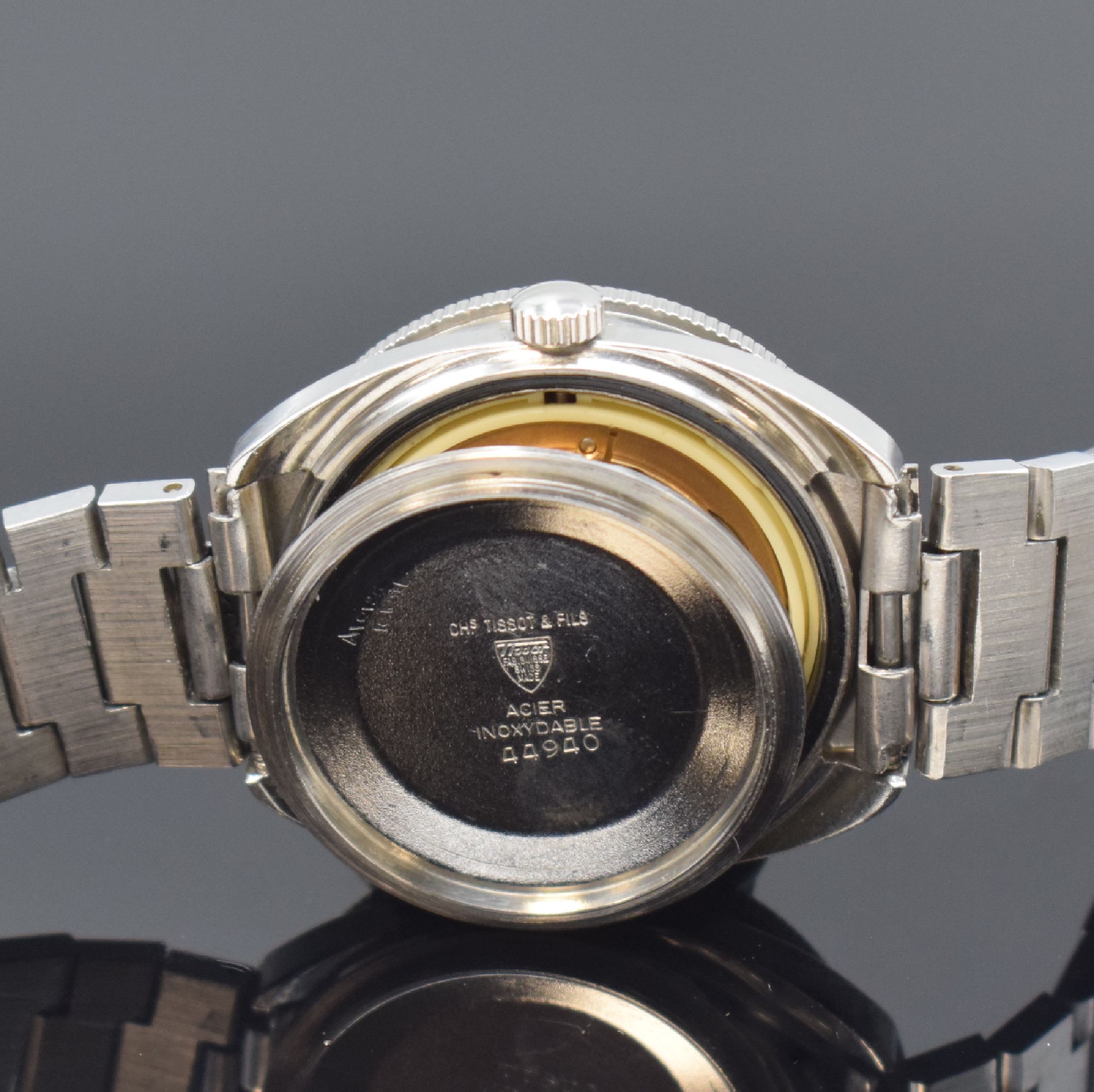 Detail g: TISSOT Navigator Herrenarmbanduhr, Schweiz um 1975, Automatik, Edelstahlgeh., Boden geschr., orig. Gliederband m. Faltschl., eins. drehb. Lünette, ...