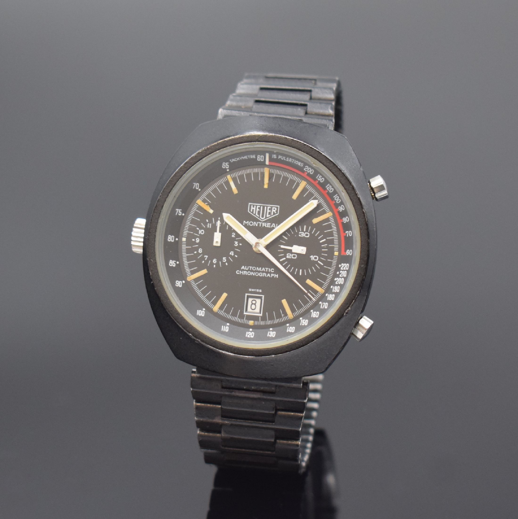 HEUER Montreal seltener Armbandchronograph, Schweiz um 1972, Automatik, geschwärztes Stahlgeh. o. Nr. inkl. NSA Gliederband mit Faltschl., verschr. ...