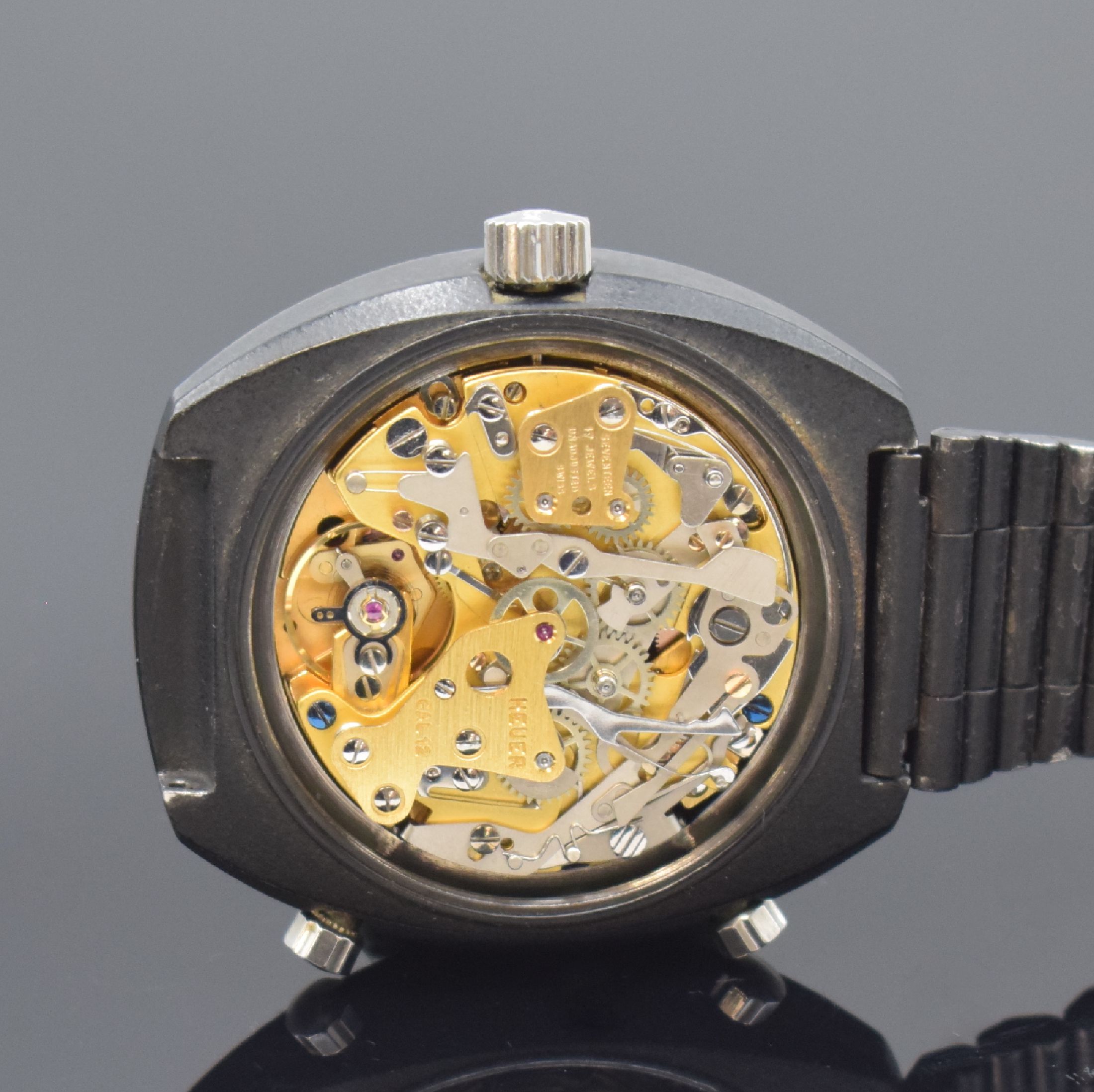 Detail e: HEUER Montreal seltener Armbandchronograph, Schweiz um 1972, Automatik, geschwärztes Stahlgeh. o. Nr. inkl. NSA Gliederband mit Faltschl., verschr. ...