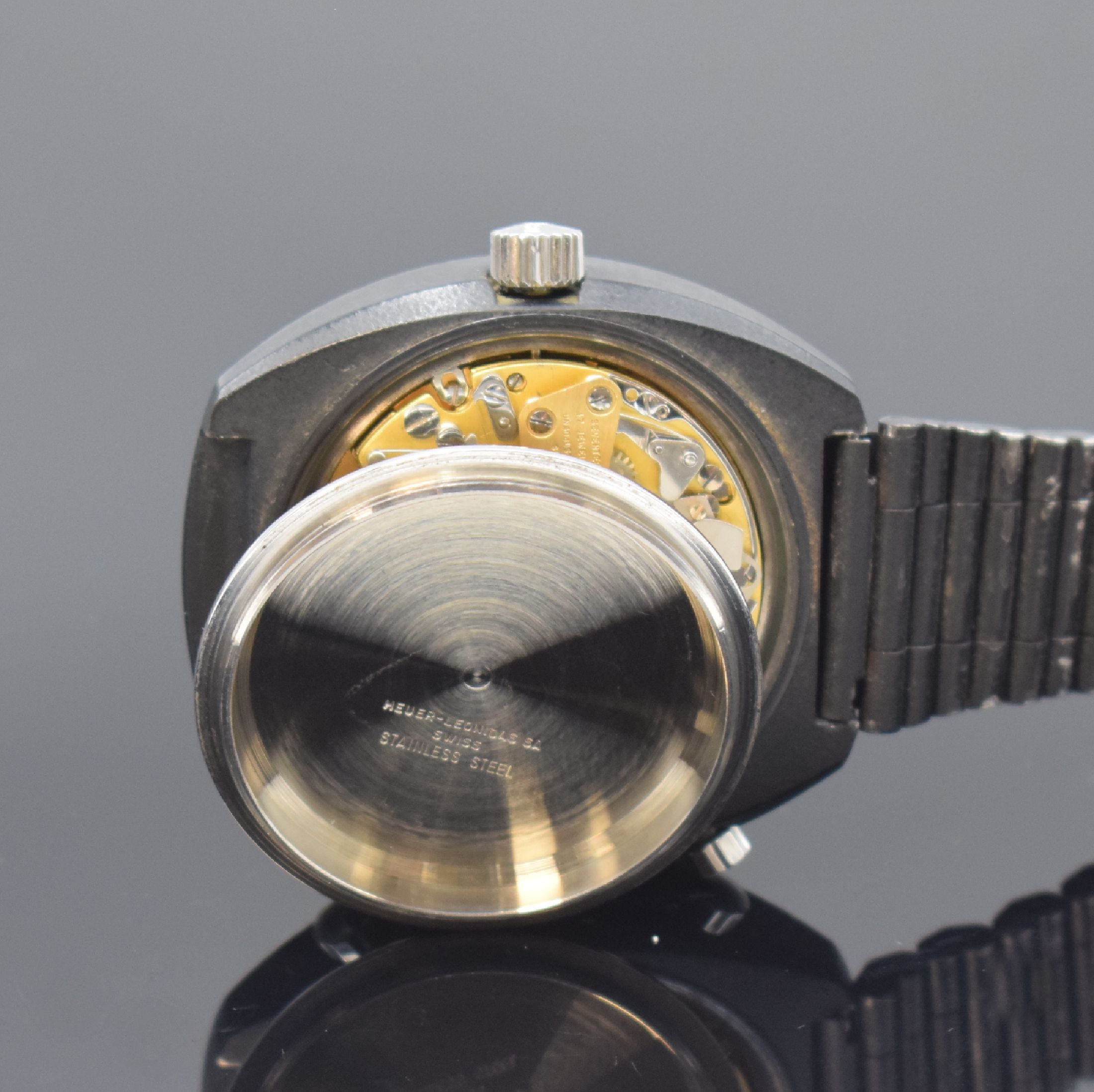 Detail f: HEUER Montreal seltener Armbandchronograph, Schweiz um 1972, Automatik, geschwärztes Stahlgeh. o. Nr. inkl. NSA Gliederband mit Faltschl., verschr. ...