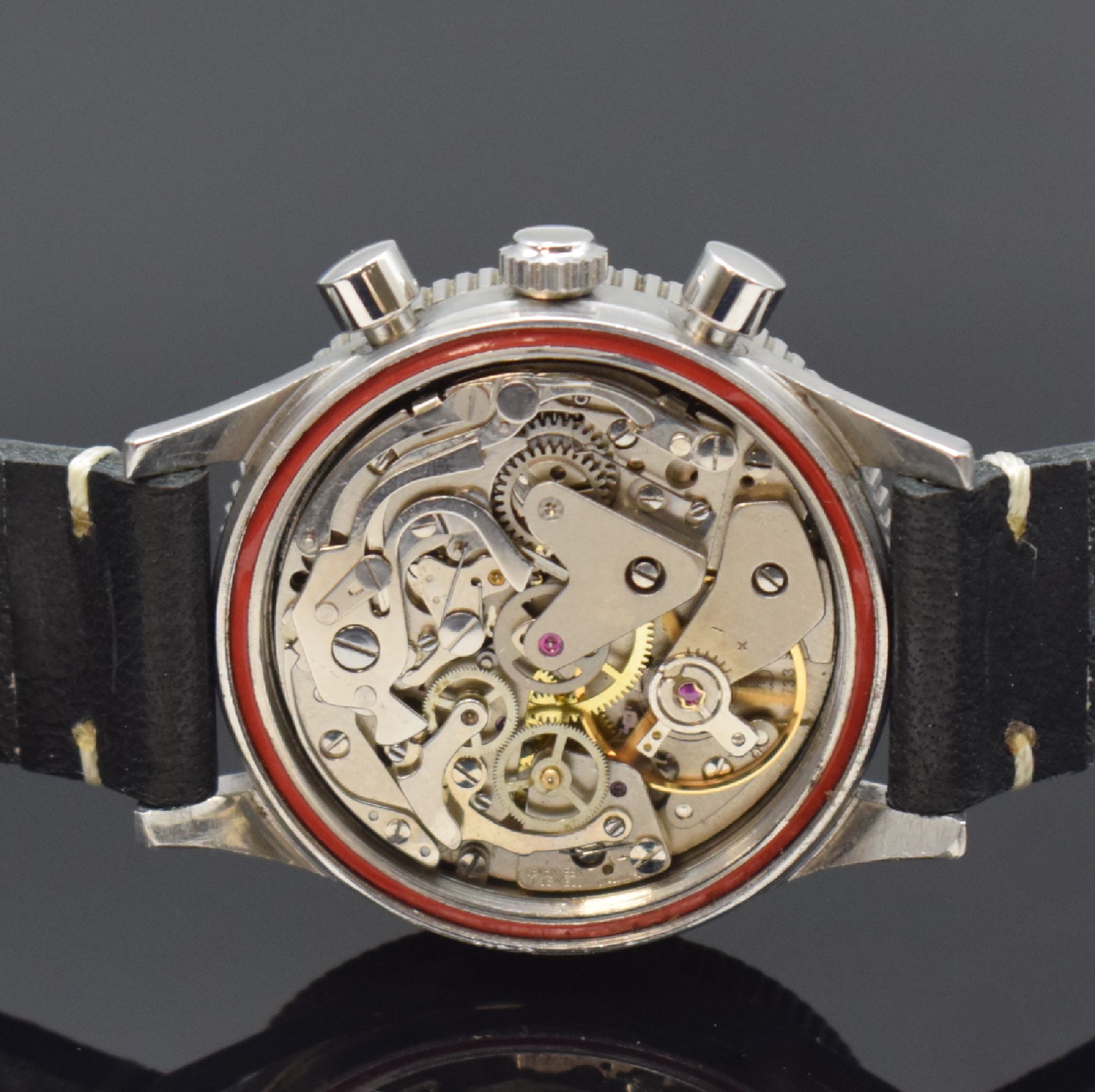 Detail d: AERO Neuchatel Herrenarmbanduhr mit Chronograph, Schweiz um 1970, Handaufzug, 2 -teil. Geh. in Stahl, Boden verschr., beids. drehb. Lünette, ...