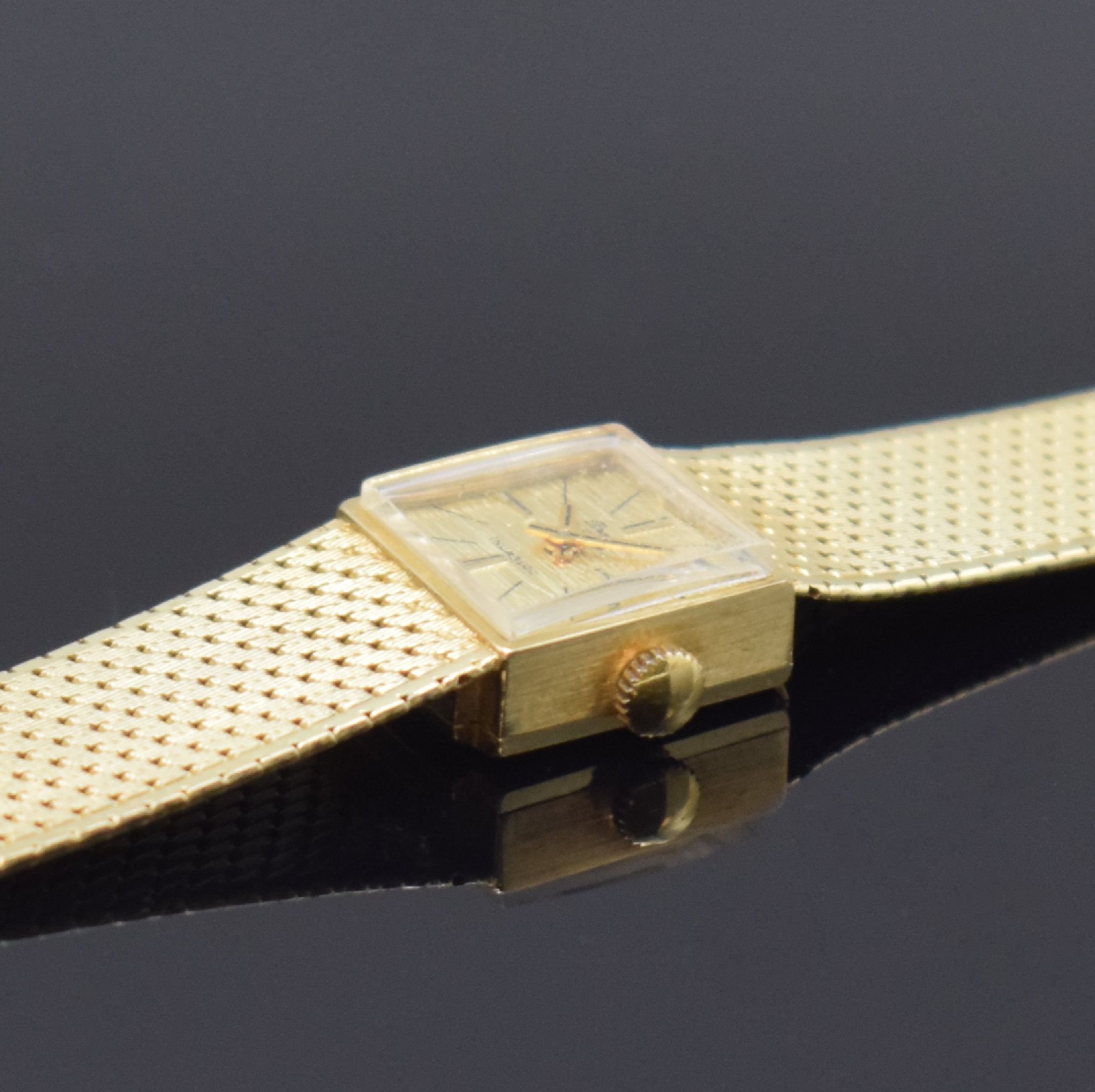 Detail b: PREDIAL Lady Damengoldbanduhr in GG 585/000, Schweiz um 1965, Handaufzug, 2-teil. Gehäuse, Boden aufgedr., Milanaiseband, gold. Zifferbl. m. aufges. ...