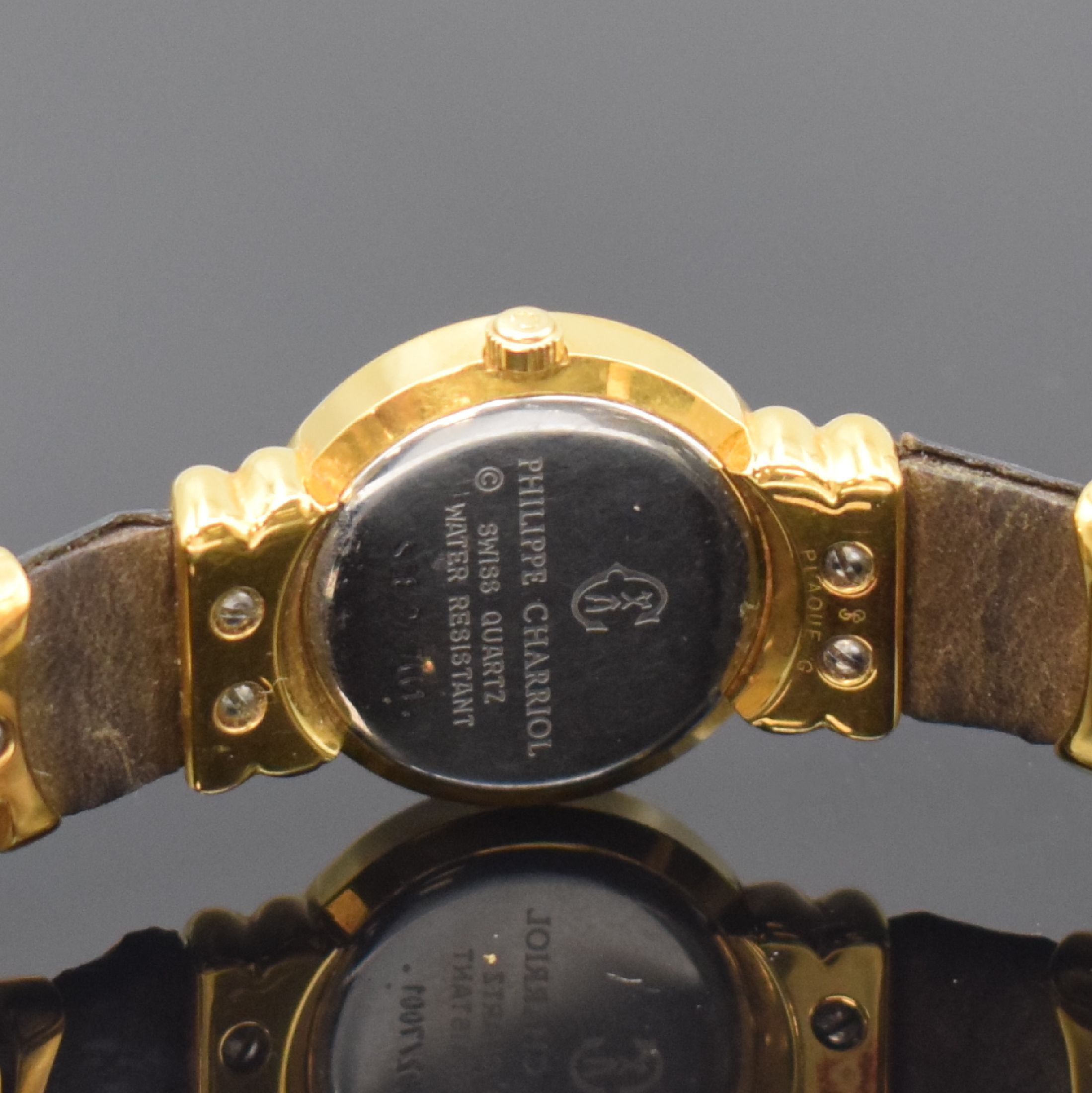 Detail d: PHILIPPE CHARRIOL St. Tropez Damenarmbanduhr Referenz S28.92, Schweiz um 1995, quarz, verg. Gehäuse, Stahlboden aufgedr., orig. Lederband, ...