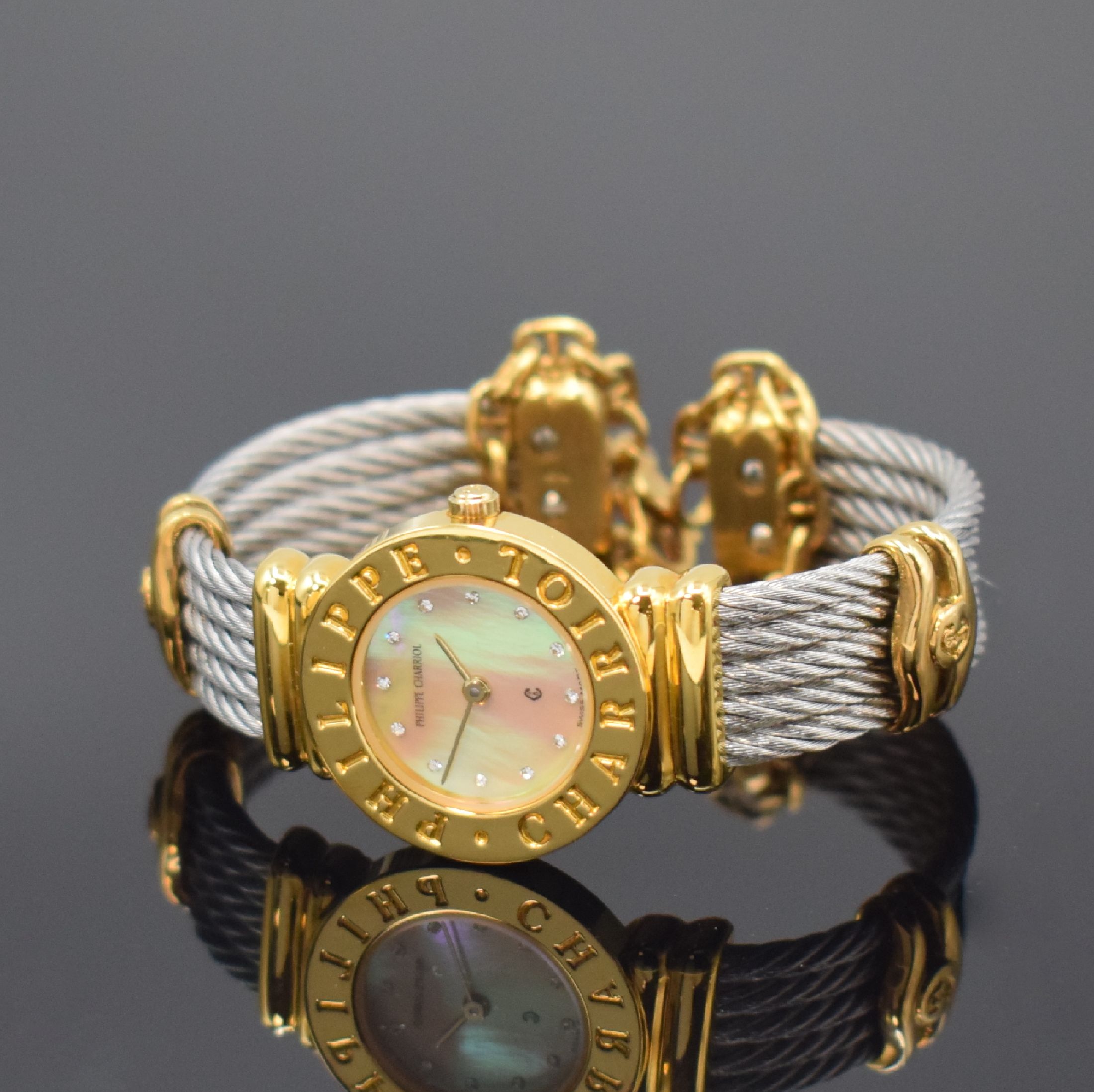 Detail b: PHILIPPE CHARRIOL St. Tropez Damenarmbanduhr Referenz S28.92, Schweiz um 1995, quarz, verg. Gehäuse, Stahlboden aufgedr., orig. Spangenband, ...