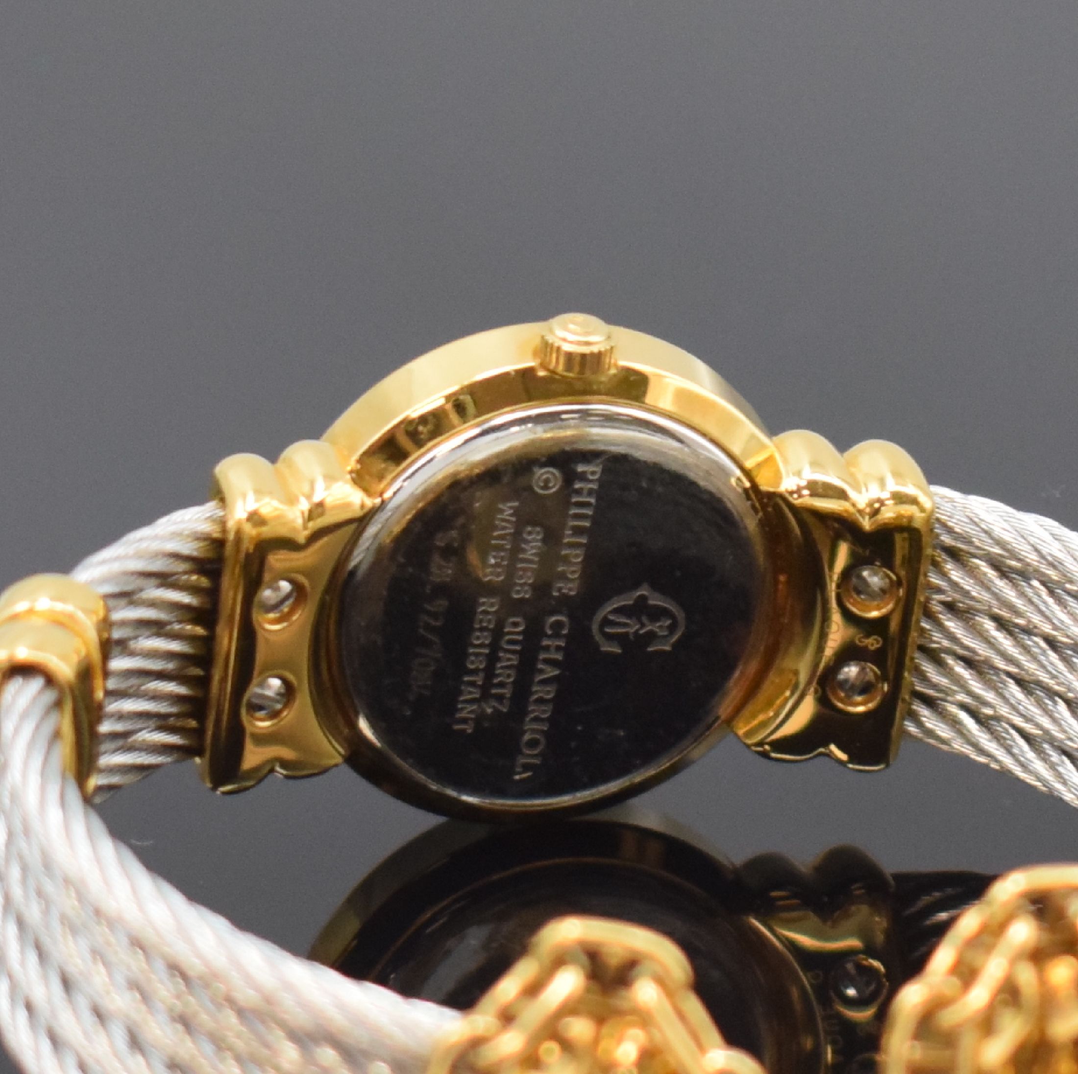 Detail c: PHILIPPE CHARRIOL St. Tropez Damenarmbanduhr Referenz S28.92, Schweiz um 1995, quarz, verg. Gehäuse, Stahlboden aufgedr., orig. Spangenband, gold. ...