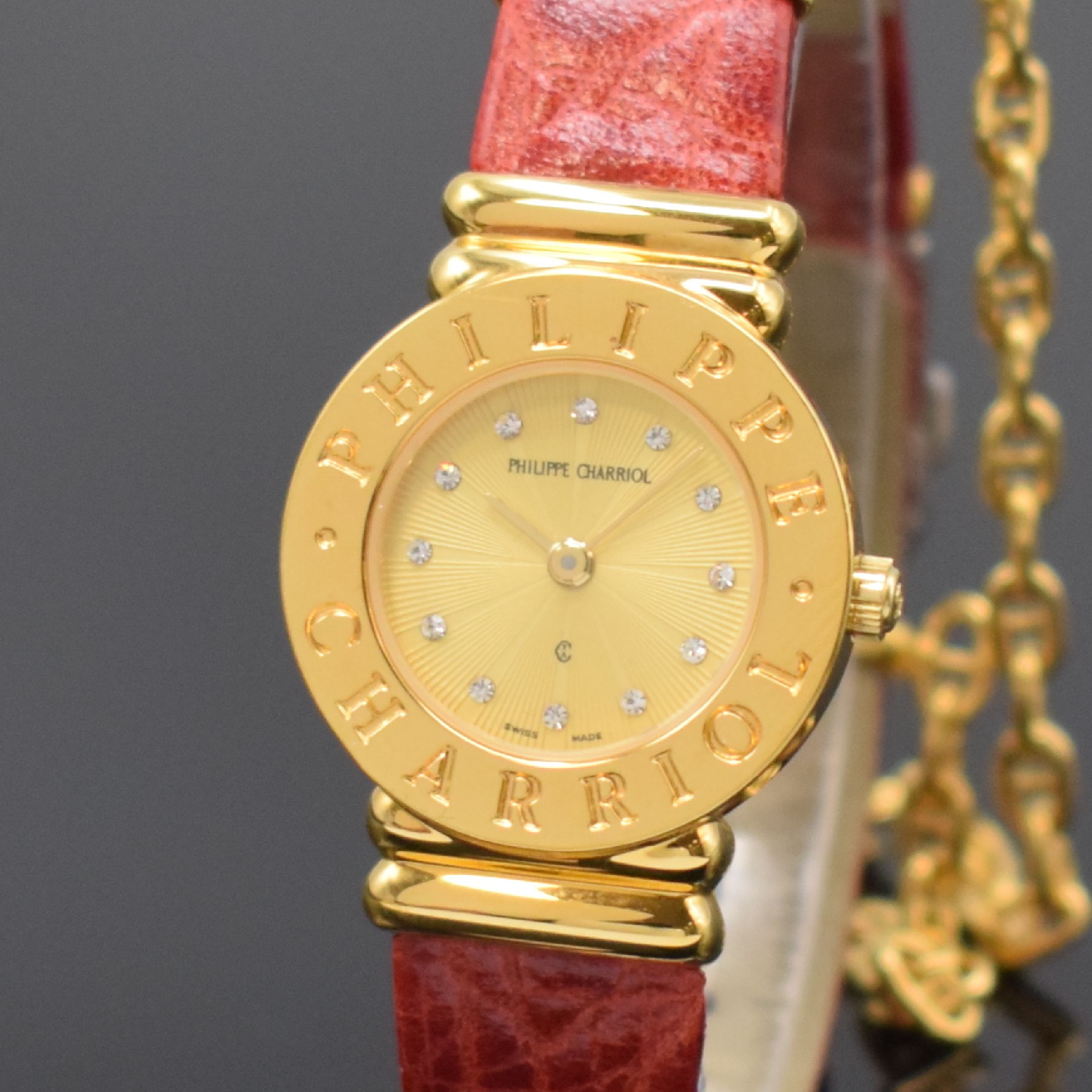 Detail a: PHILIPPE CHARRIOL St. Tropez Damenarmbanduhr Referenz S28.92, Schweiz um 1995, quarz, verg. Gehäuse, Stahlboden aufgedr., orig. Lederband, gold. ...
