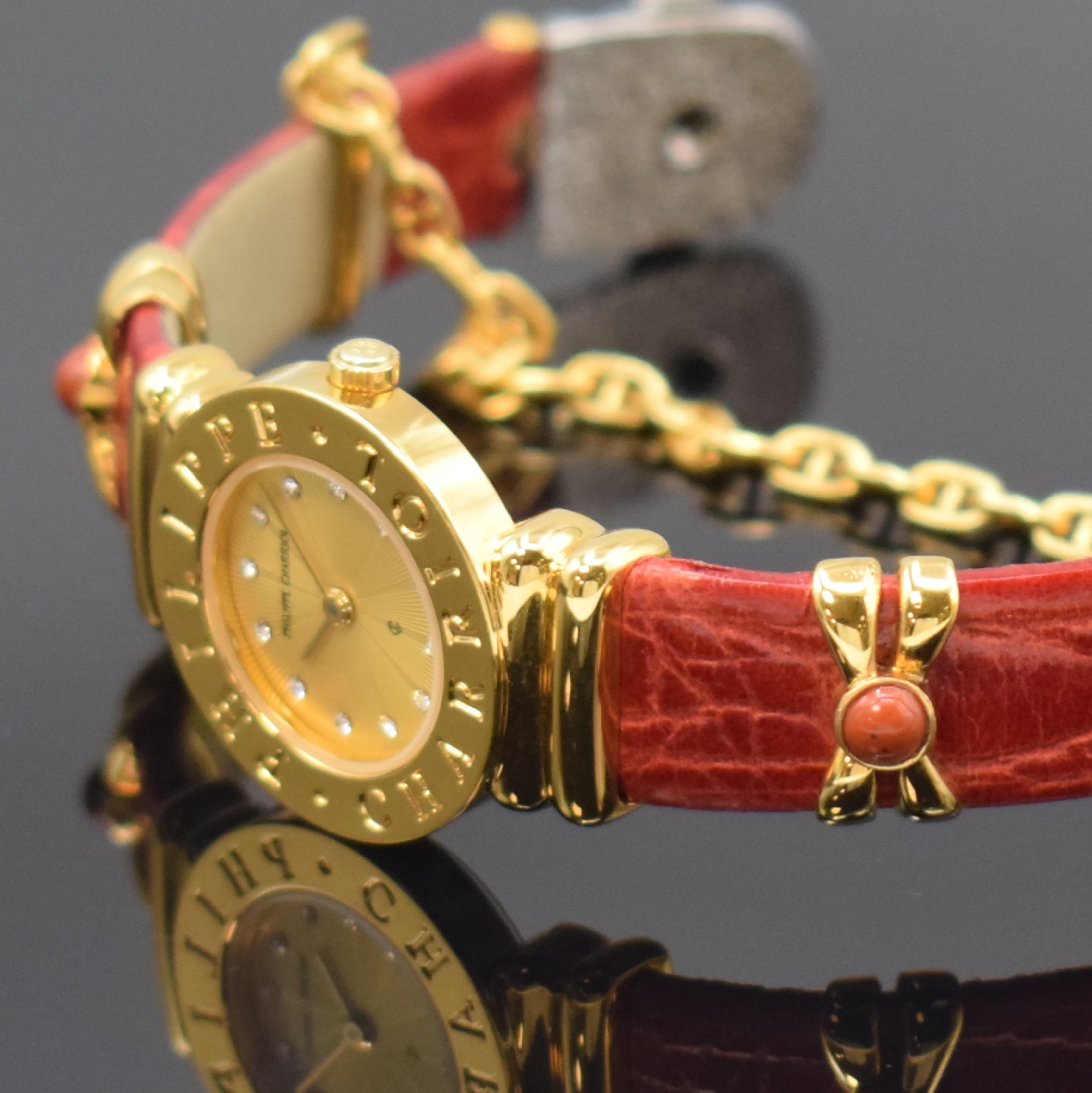 Detail c: PHILIPPE CHARRIOL St. Tropez Damenarmbanduhr Referenz S28.92, Schweiz um 1995, quarz, verg. Gehäuse, Stahlboden aufgedr., orig. Lederband, gold. ...