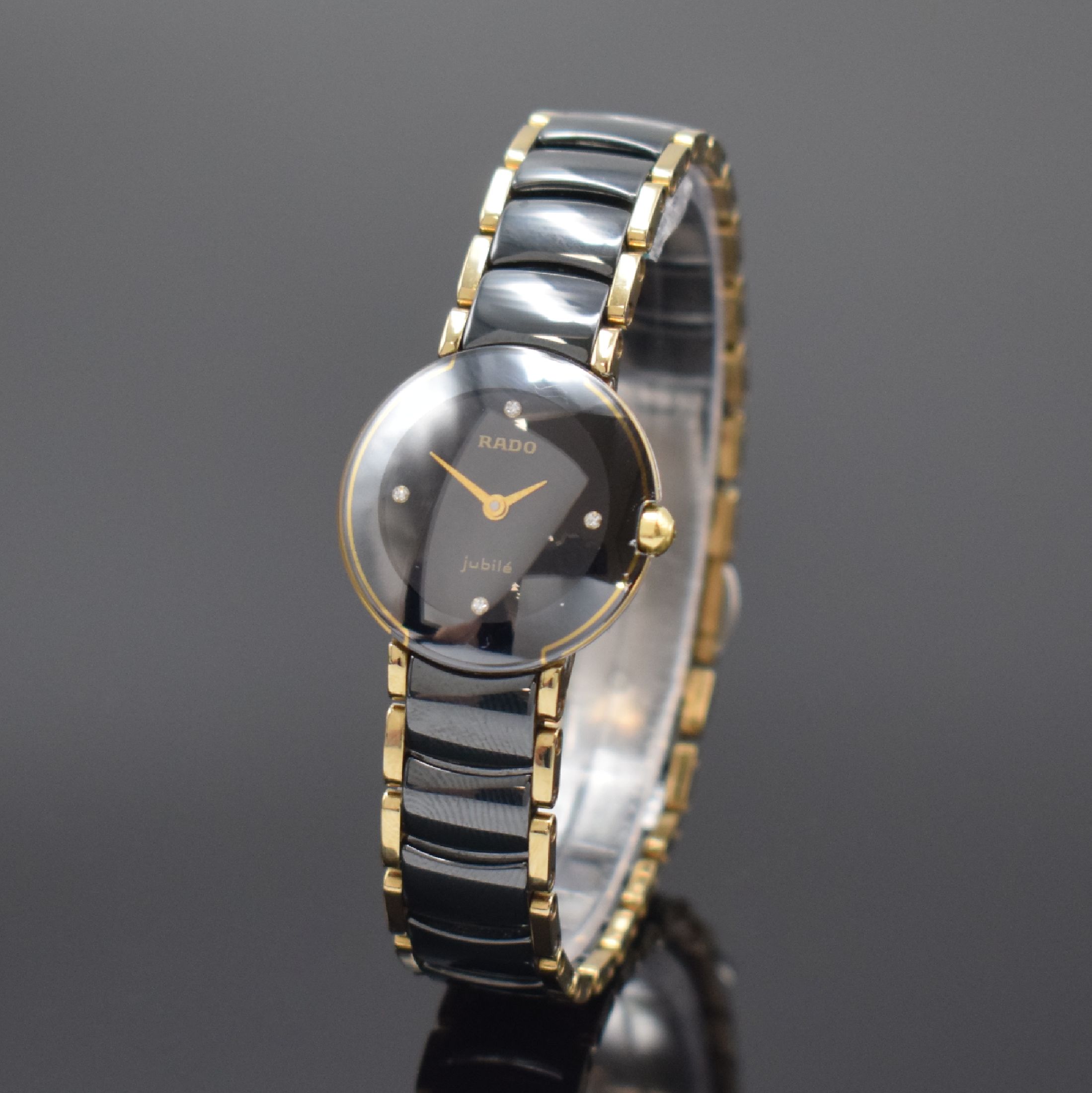 RADO Jubile Damenarmbanduhr Referenz 204.0302.3, Schweiz um 2000, quarz, 2-teil. Edelstahlgeh., Boden aufgedr., schwarzes Zifferbl., gold. Zeiger, ...