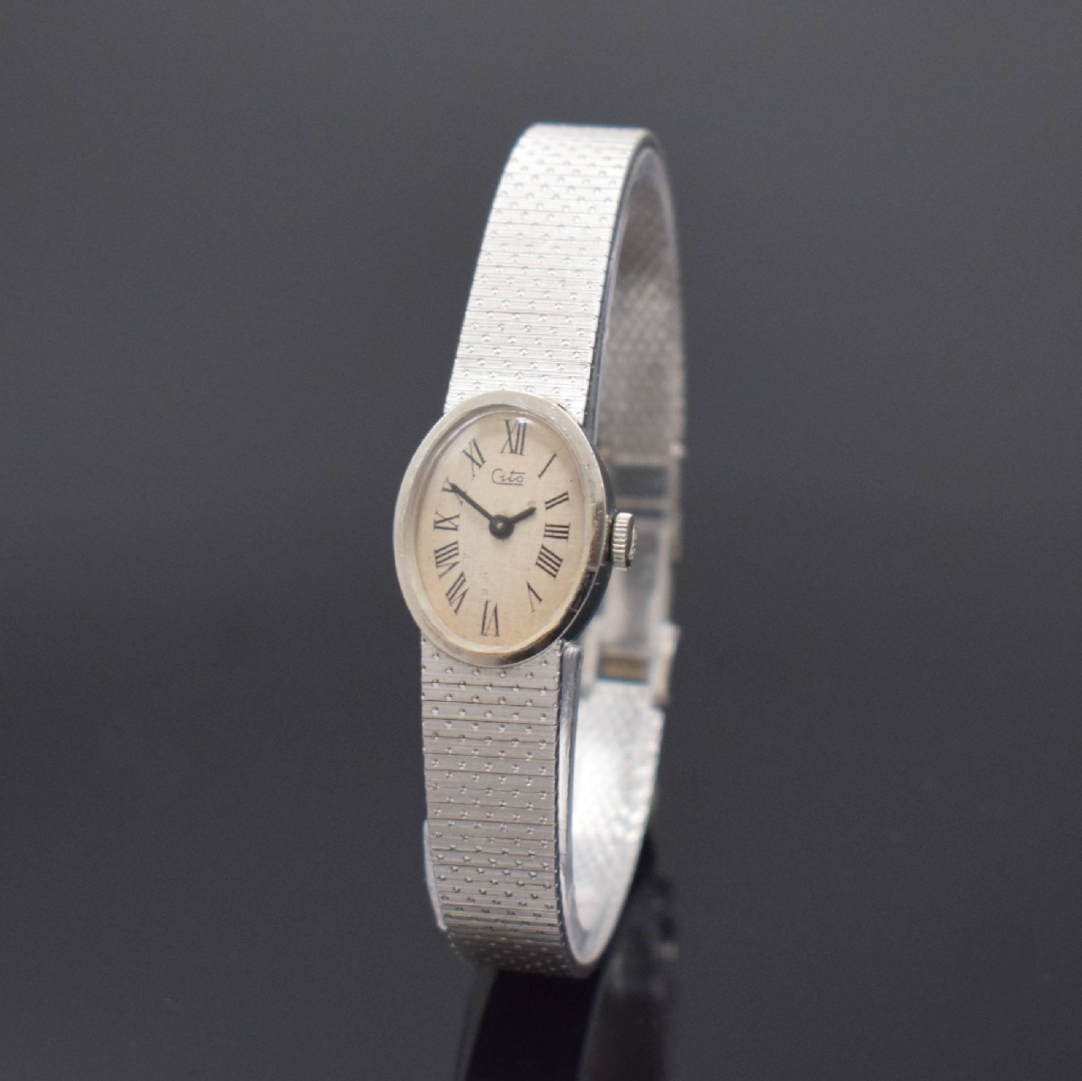 CITO Damenarmbanduhr in WG 750/000, Schweiz um 1970, Handaufzug, 2-teil. Gehäuse, Boden aufgedr., silb. Zifferbl. m. röm. Zahlen, rotverg. Werk ...