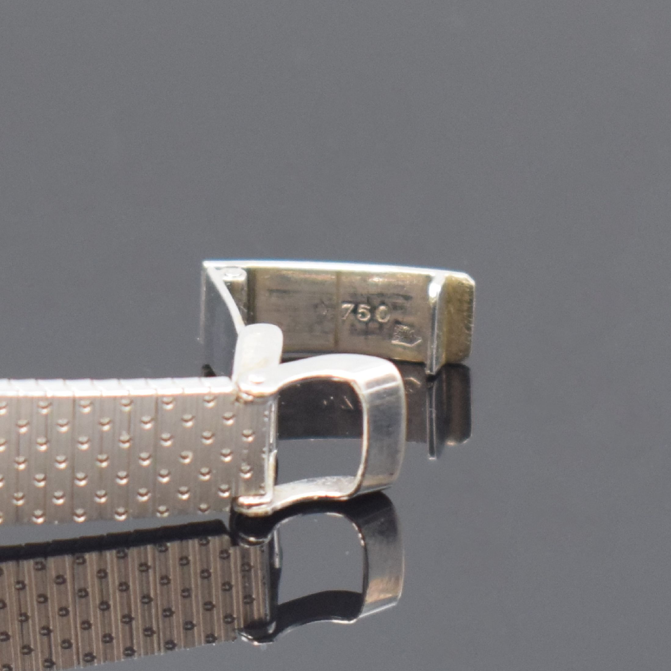 Detail b: CITO Damenarmbanduhr in WG 750/000, Schweiz um 1970, Handaufzug, 2-teil. Gehäuse, Boden aufgedr., silb. Zifferbl. m. röm. Zahlen, rotverg. Werk ...