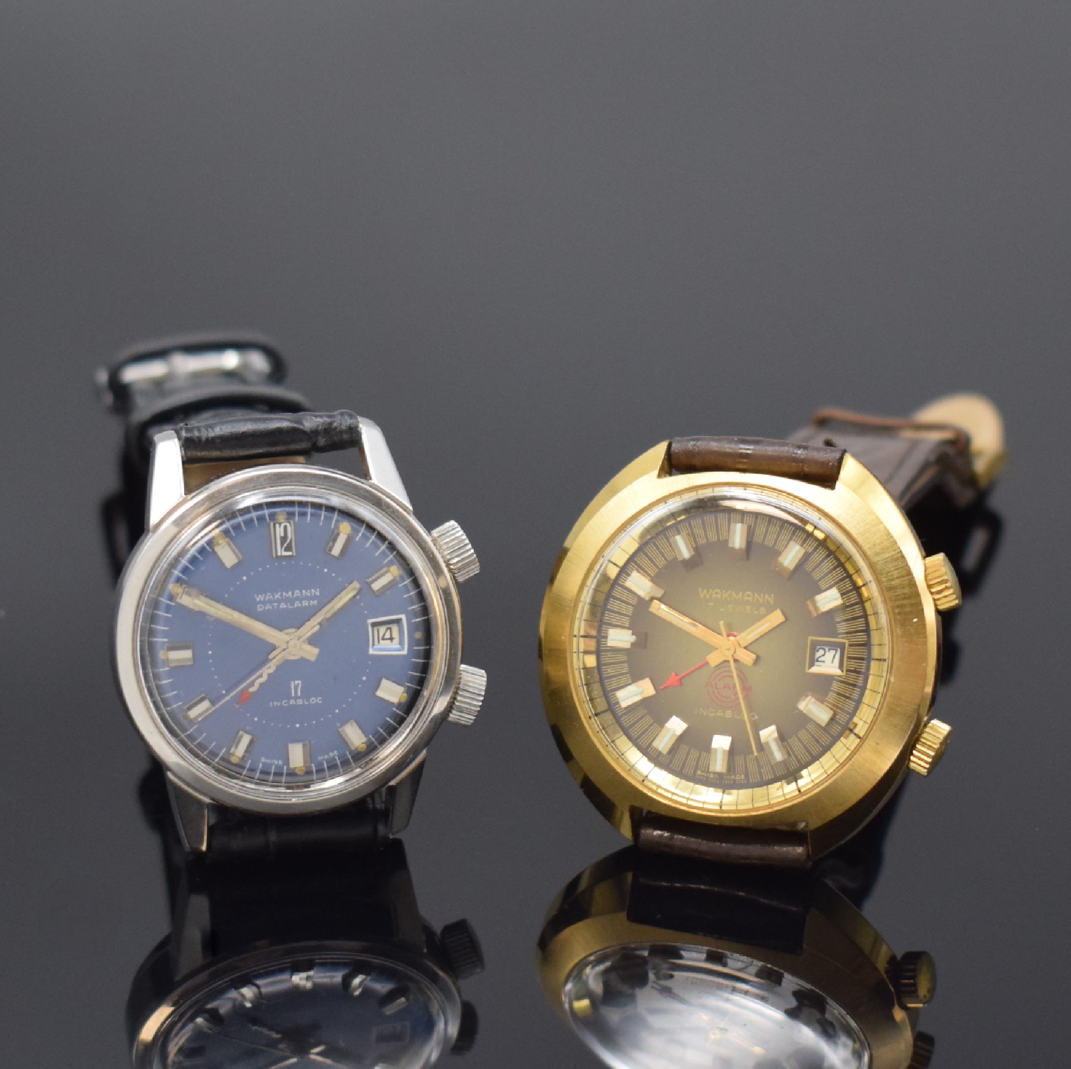 WAKMANN 2 Armbandwecker Kaliber AS 1931, Schweiz um 1970, Handaufzug, 2-tlg. Geh. m. verschr. Stahlböden, 1) blaues Zifferbl., silb. Indizes u. ...