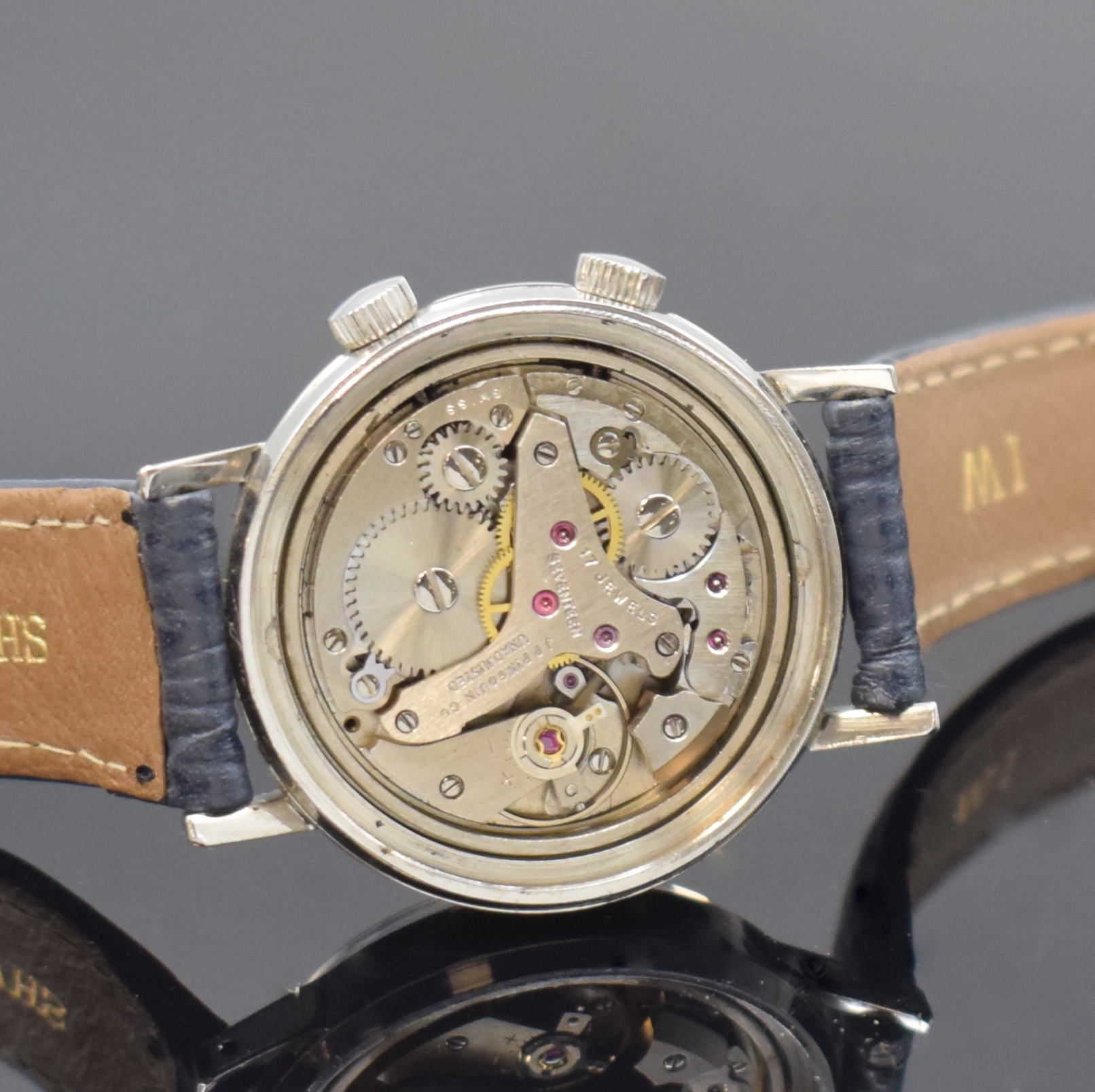 Detail g: 5 Armbandwecker, Schweiz / UDSSR ca. 1950 - 1970, Handaufzug, verschr. Geh. m. Stahlböden, 3 x verg., 2 x Stahl, silb. Zifferblätter teils pat., 3 ...