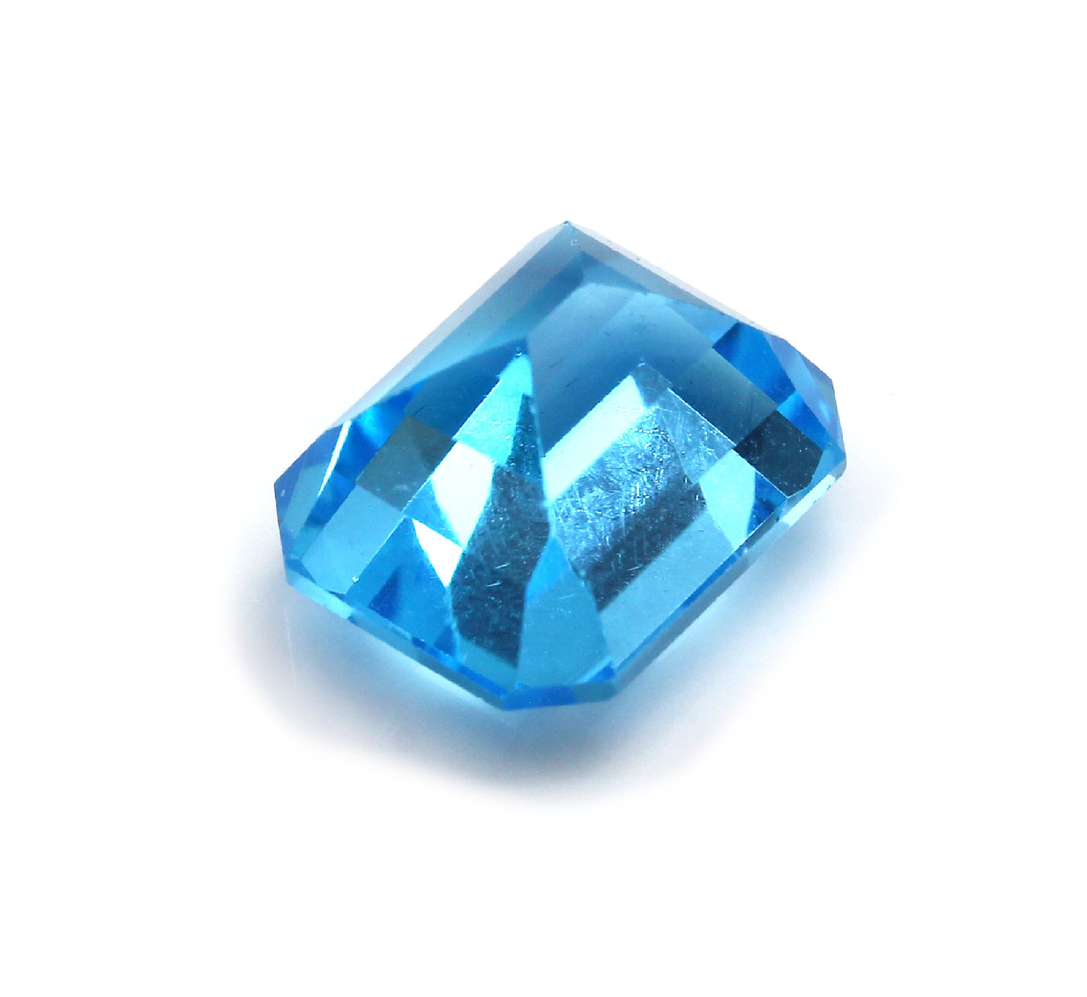 Detail a: Loser facett. Blautopas, 9.10 ct (beh.)