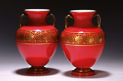 Image 26695856 - Pair of amphora vases, Italy, probably first half of the 20th century, red glass, opaque white interior overlay, double handle, surrounding gold decoration, height approx. 20cm