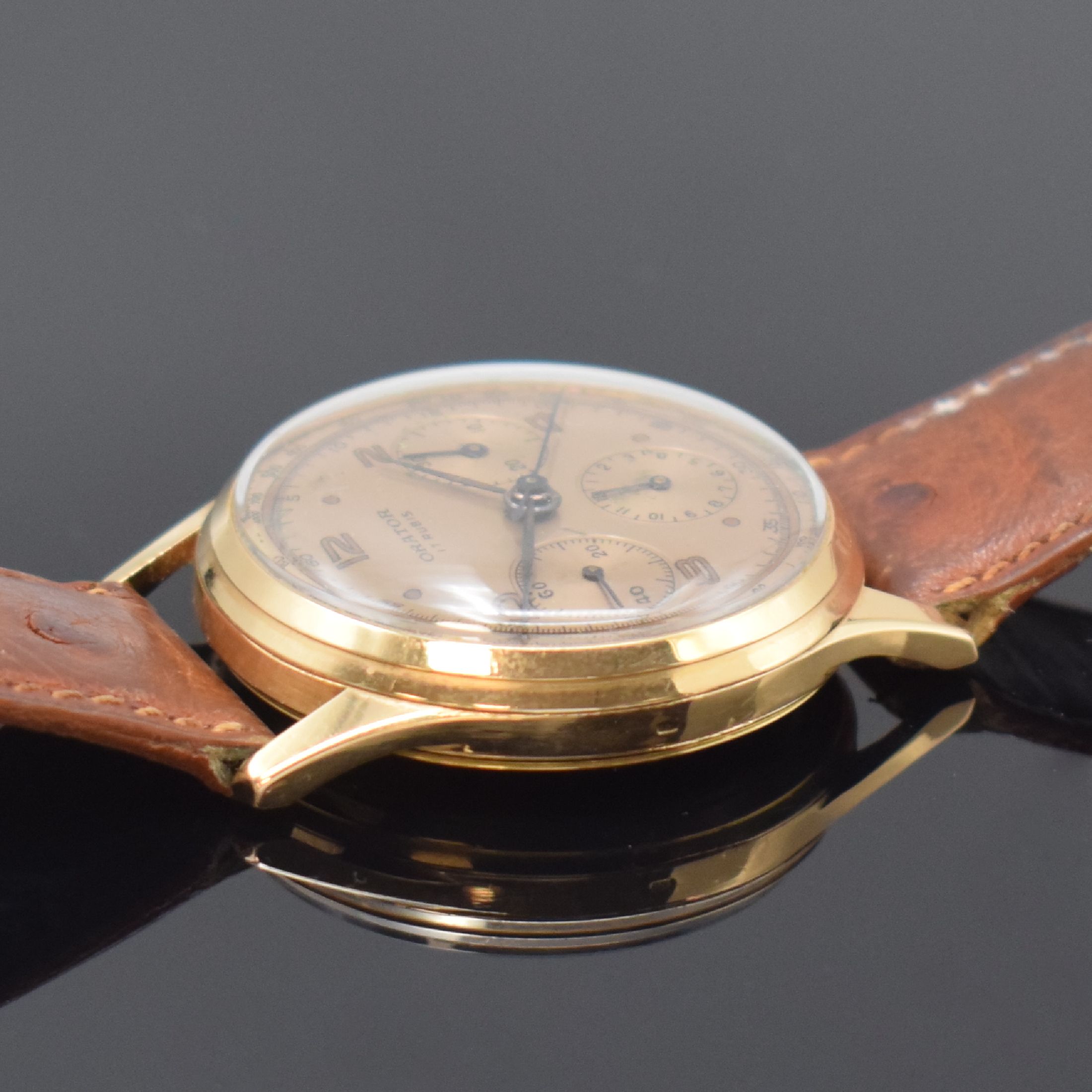 Detail c: ORATOR Herrenarmbanduhr mit Chronograph in RoseG 750/000, Schweiz um 1950, Handaufzug, 3-teiliges Geh., Boden und Glasrand aufgedr., kupferfarb. ...