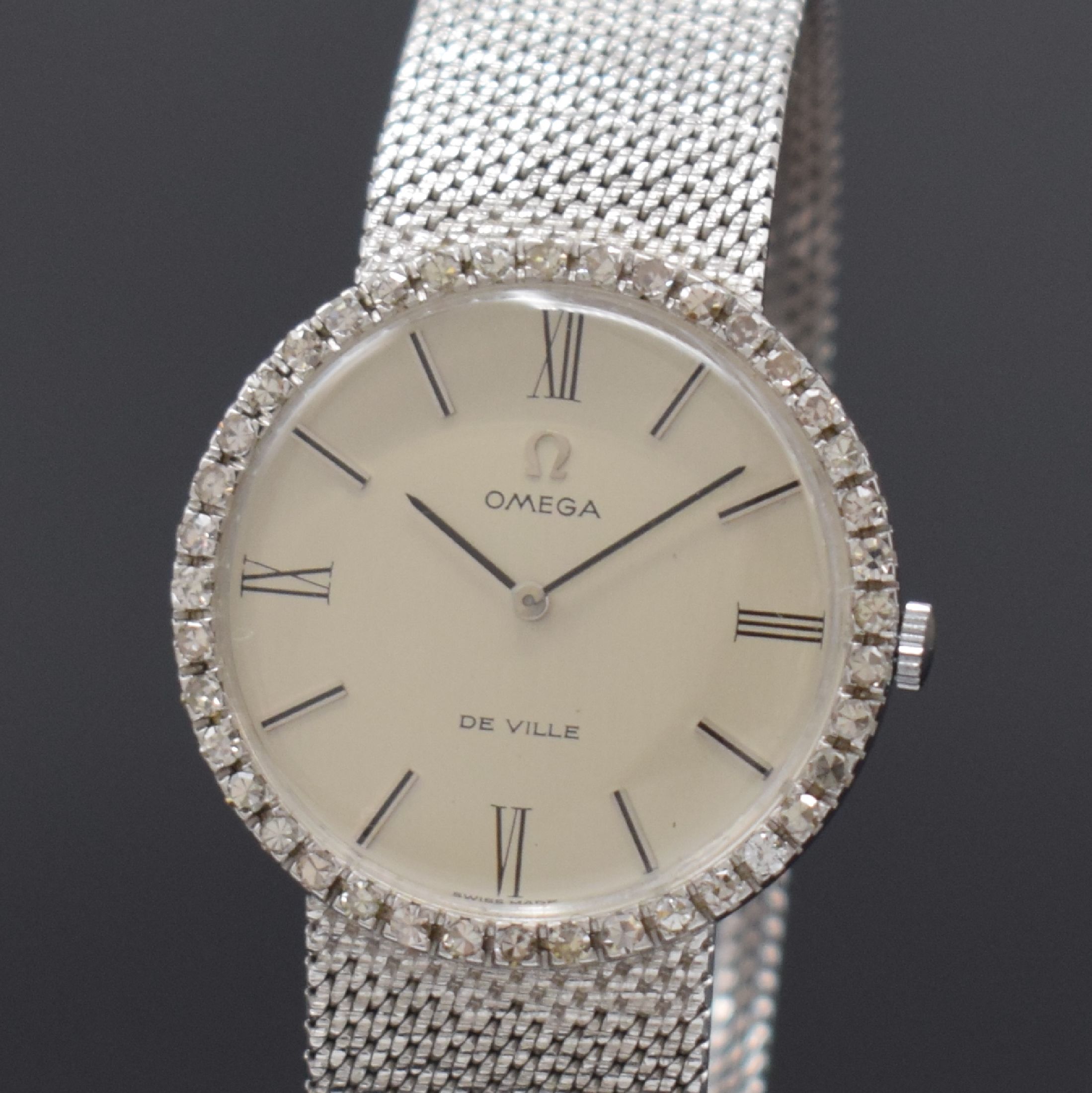 Detail a: Armbanduhr in WG 750/000 mit OMEGA Werk, Werk Schweiz um 1969, neutr. Gehäuse und Milanaiseband in WG 750/000 später, Handaufzug, silb. Zifferbl. ...
