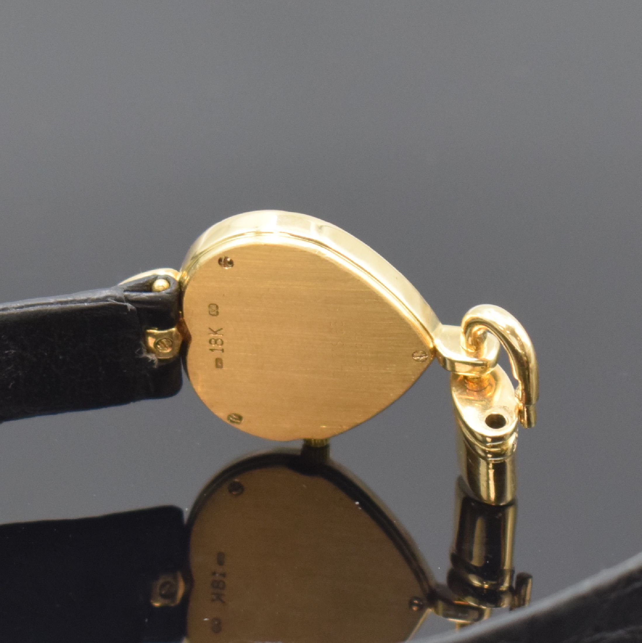Detail d: CORUM herzförmige Damenarmbanduhr in GG 750/000, Schweiz um 2010, quarz, Boden 3- fach verschr., Gehäuse aufw. m. Brillanten u. Citrin bes., ...