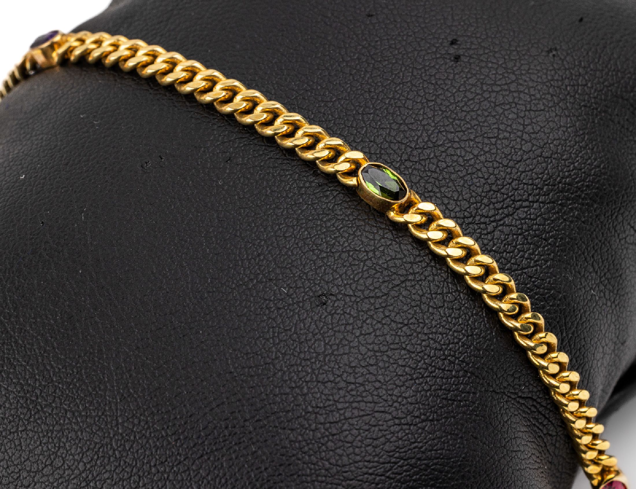8 kt Gold Farbstein Armband GG 333/000, Flachpanzer mit ovalfacett. Farbsteinen (Turmalin, Amethyst, Topas), total ca. 6.5 g, L ca. 18.5 cm, ...