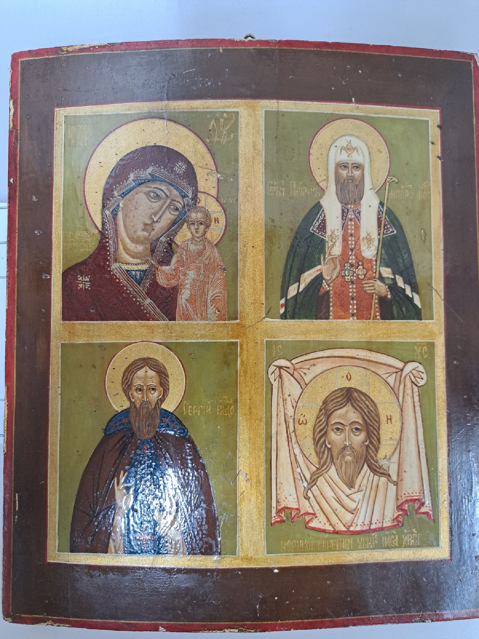 Detail a: Vierfelderikone, Russland, 20.Jh., Tempera auf Holz, Vier Felder mit Marienikone, Patriarch, Heiligem und Vera Icon, Alterssp., 31x26 cm