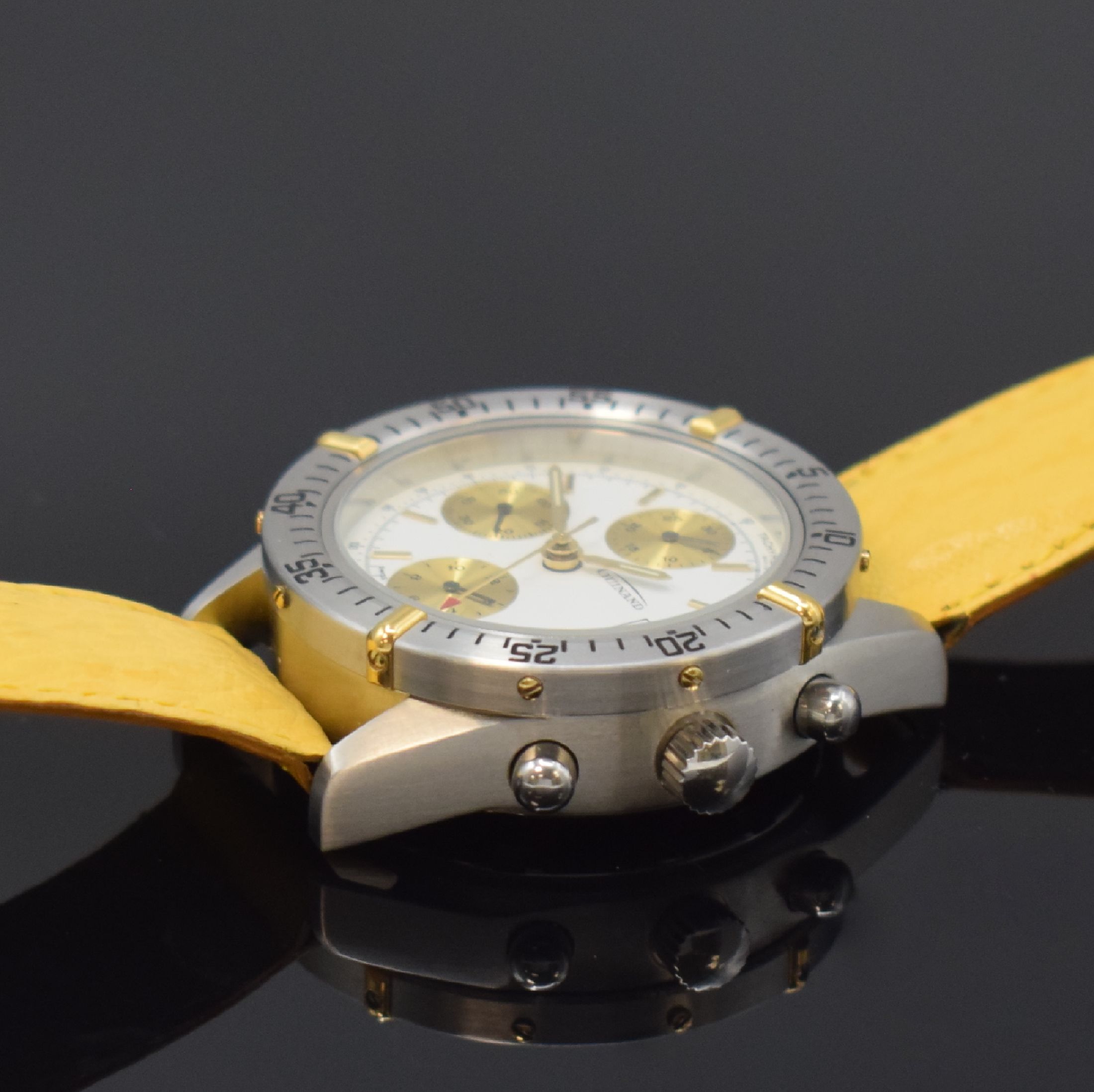 Detail b: GUINAND nahezu neuwertiger Armbandchronograph, Schweiz um 2000, Automatik, verschr. Geh. in Edelstahl, eins. drehb. Lünette m. gold. Reiter, weißes ...