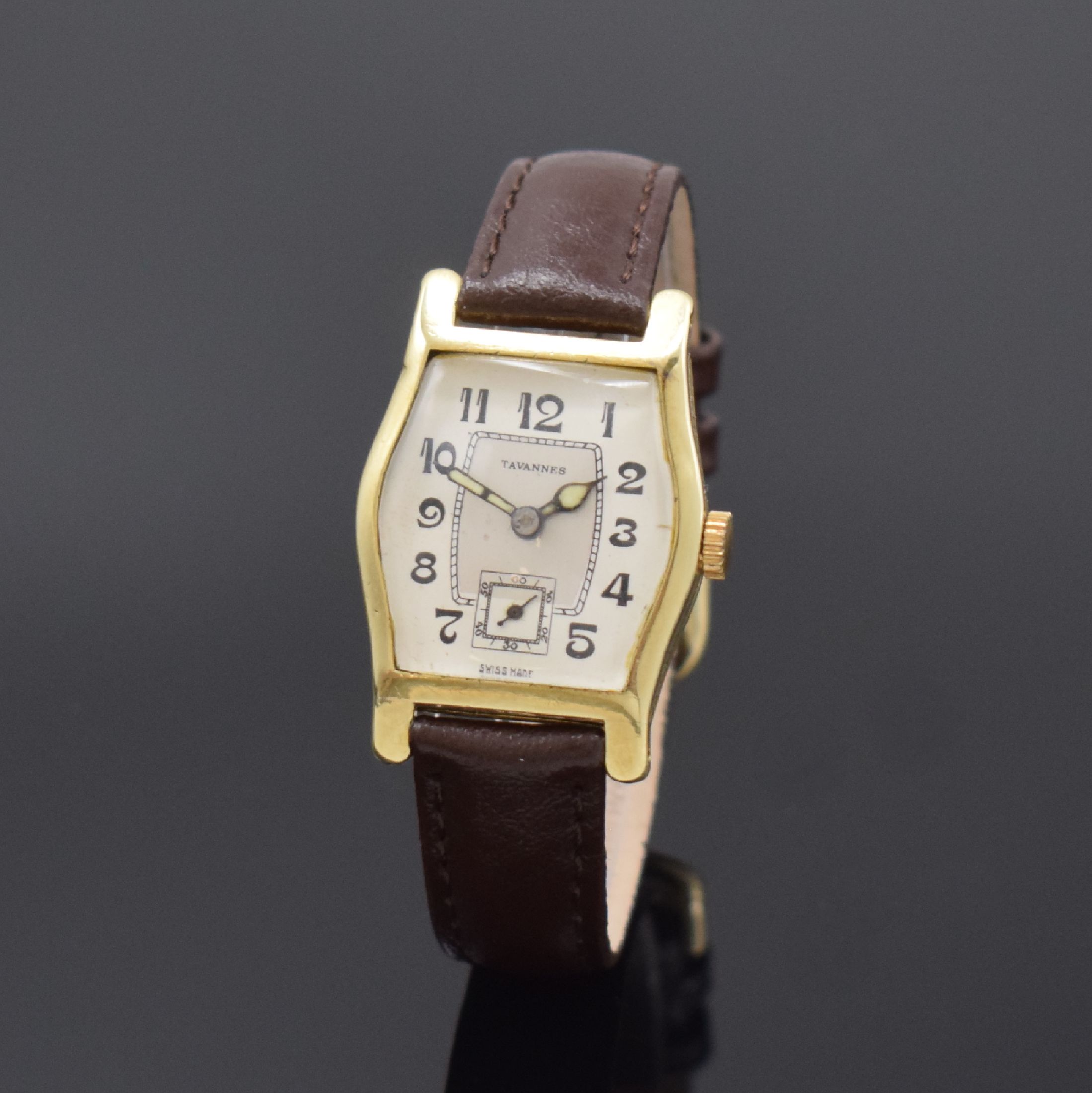 TAVANNES Armbanduhr in GG 585/000, Schweiz um 1930, Handaufzug, seitl. grav. Geh. u. Scharnierboden dell., silb. Zifferbl. rest., arab. Zahlen, ...