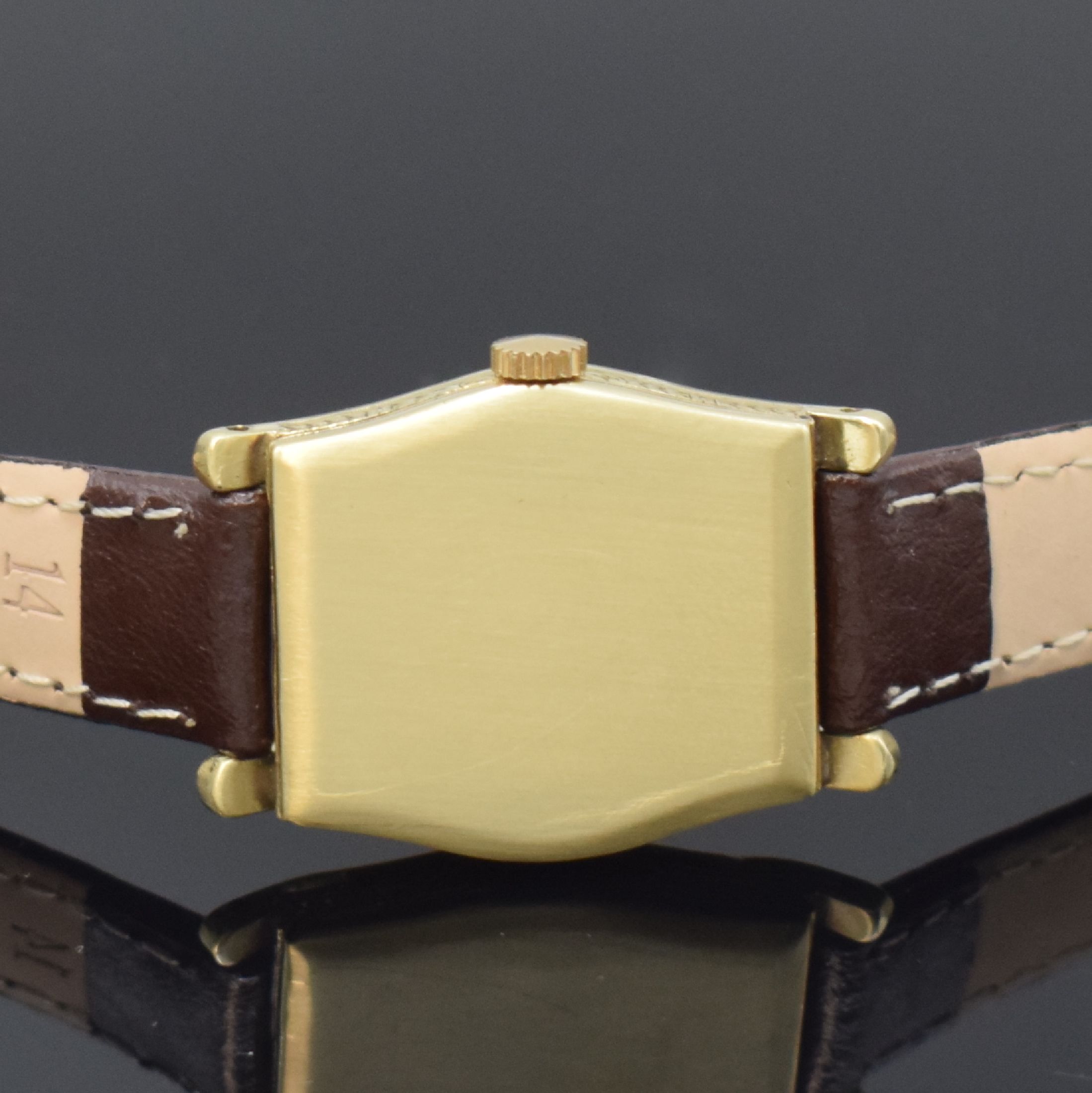 Detail c: TAVANNES Armbanduhr in GG 585/000, Schweiz um 1930, Handaufzug, seitl. grav. Geh. u. Scharnierboden dell., silb. Zifferbl. rest., arab. Zahlen, ...