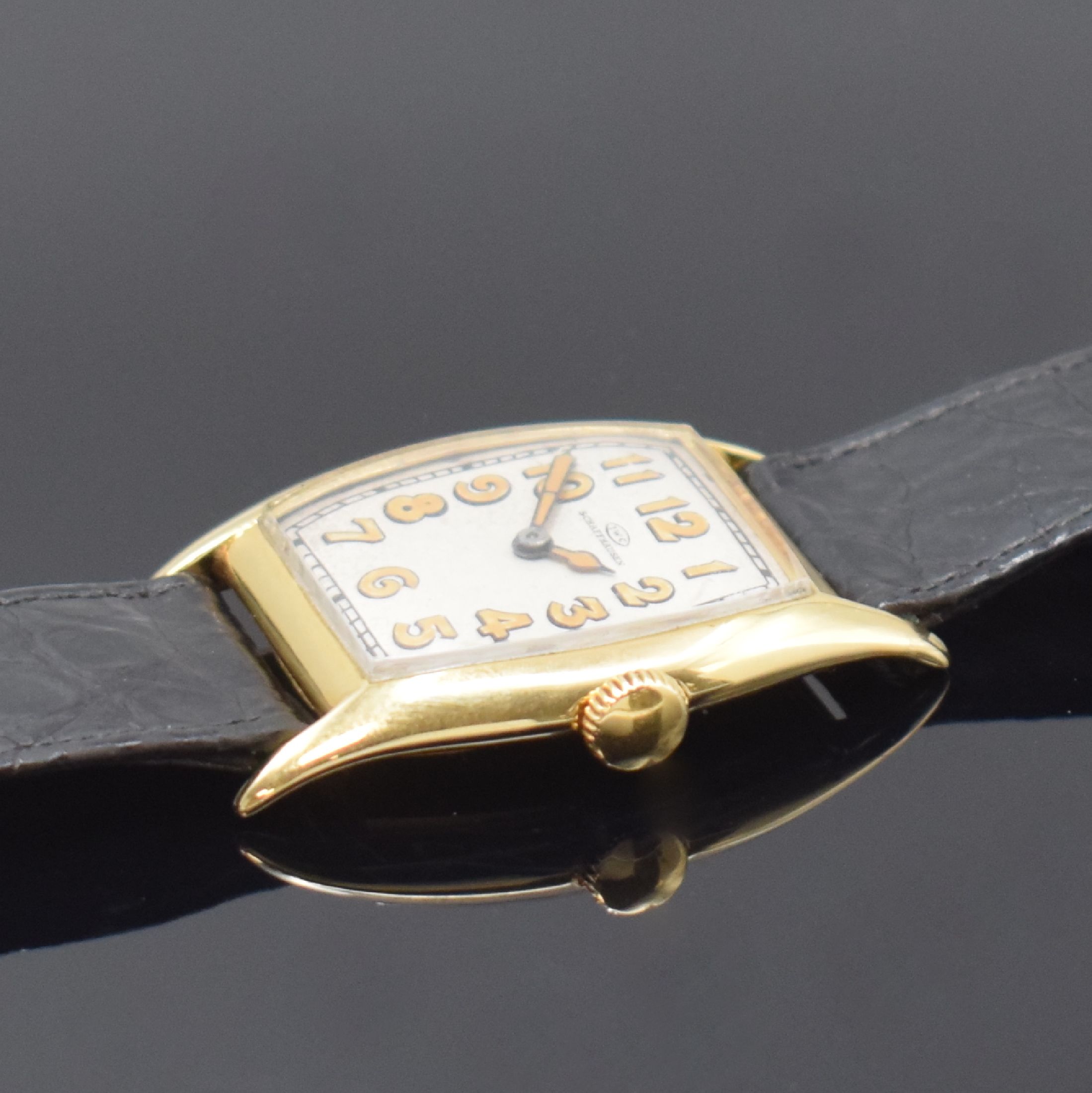 Detail b: IWC Armbanduhr in GG 750/000, Schweiz/USA um 1926, Handaufzug, unsign. Geh., Scharnierboden, silb. Zifferbl. m. arab. Zahlen, Leuchtzeiger, Ankerwerk ...