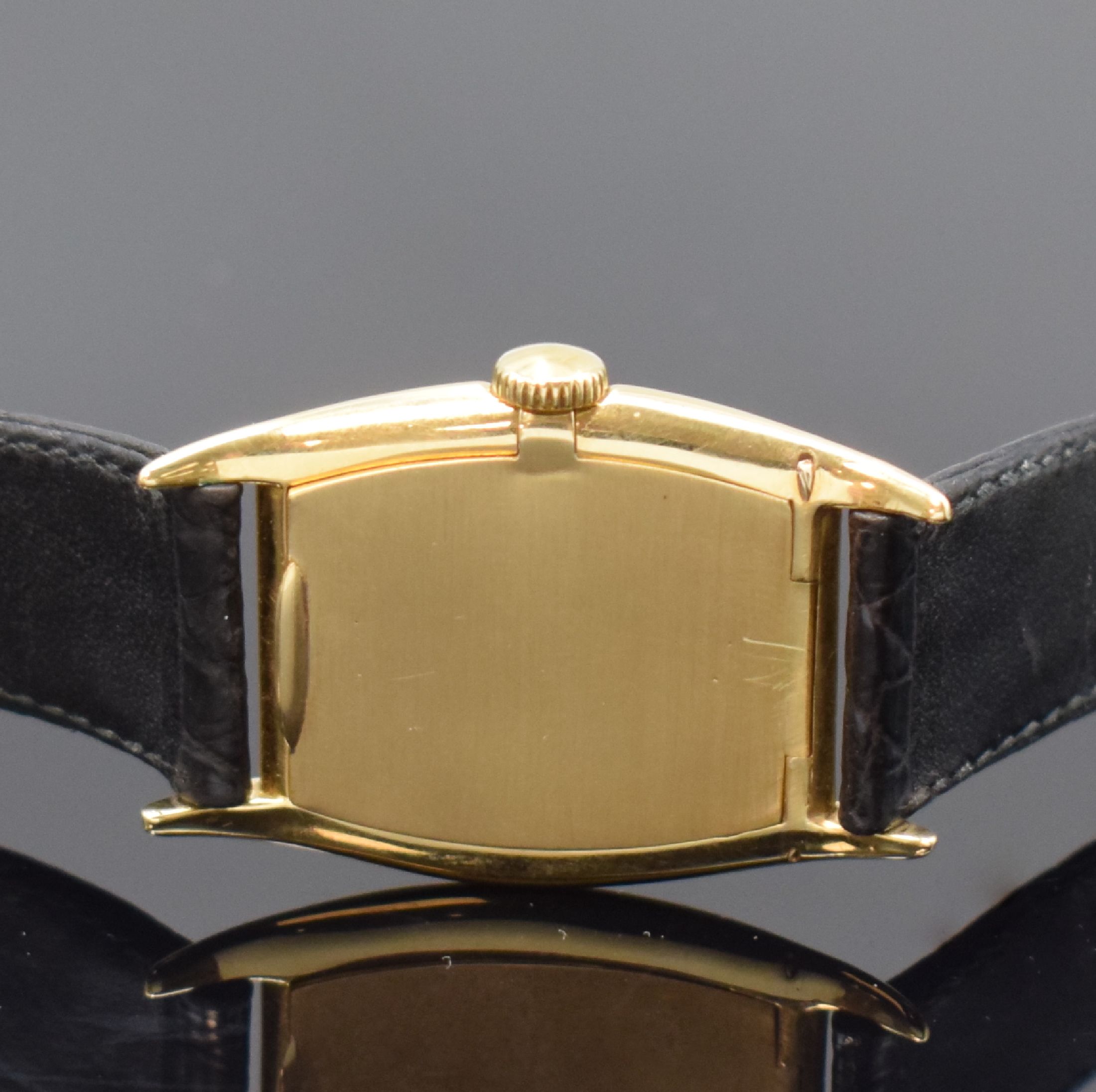 Detail c: IWC Armbanduhr in GG 750/000, Schweiz/USA um 1926, Handaufzug, unsign. Geh., Scharnierboden, silb. Zifferbl. m. arab. Zahlen, Leuchtzeiger, Ankerwerk ...