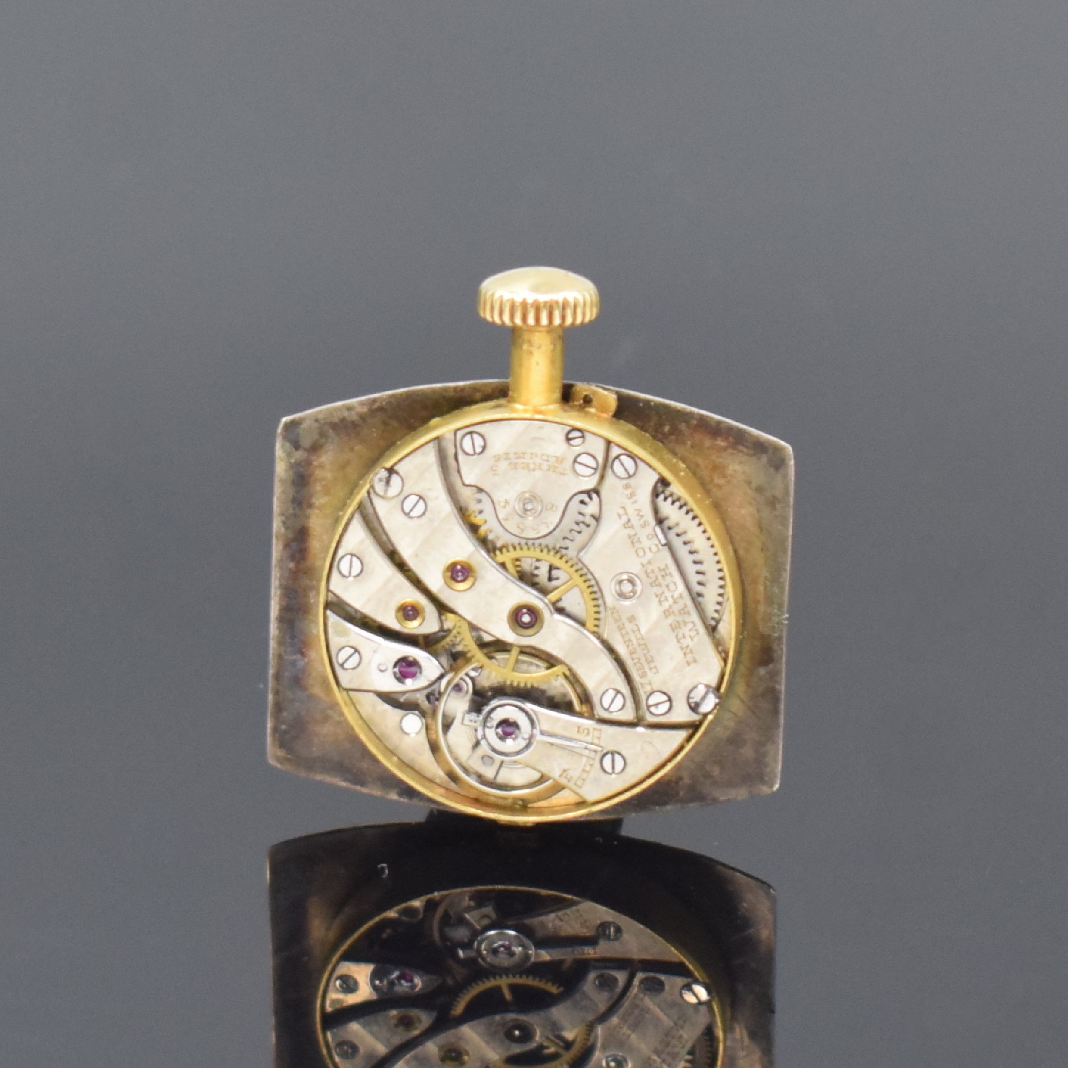 Detail e: IWC Armbanduhr in GG 750/000, Schweiz/USA um 1926, Handaufzug, unsign. Geh., Scharnierboden, silb. Zifferbl. m. arab. Zahlen, Leuchtzeiger, Ankerwerk ...
