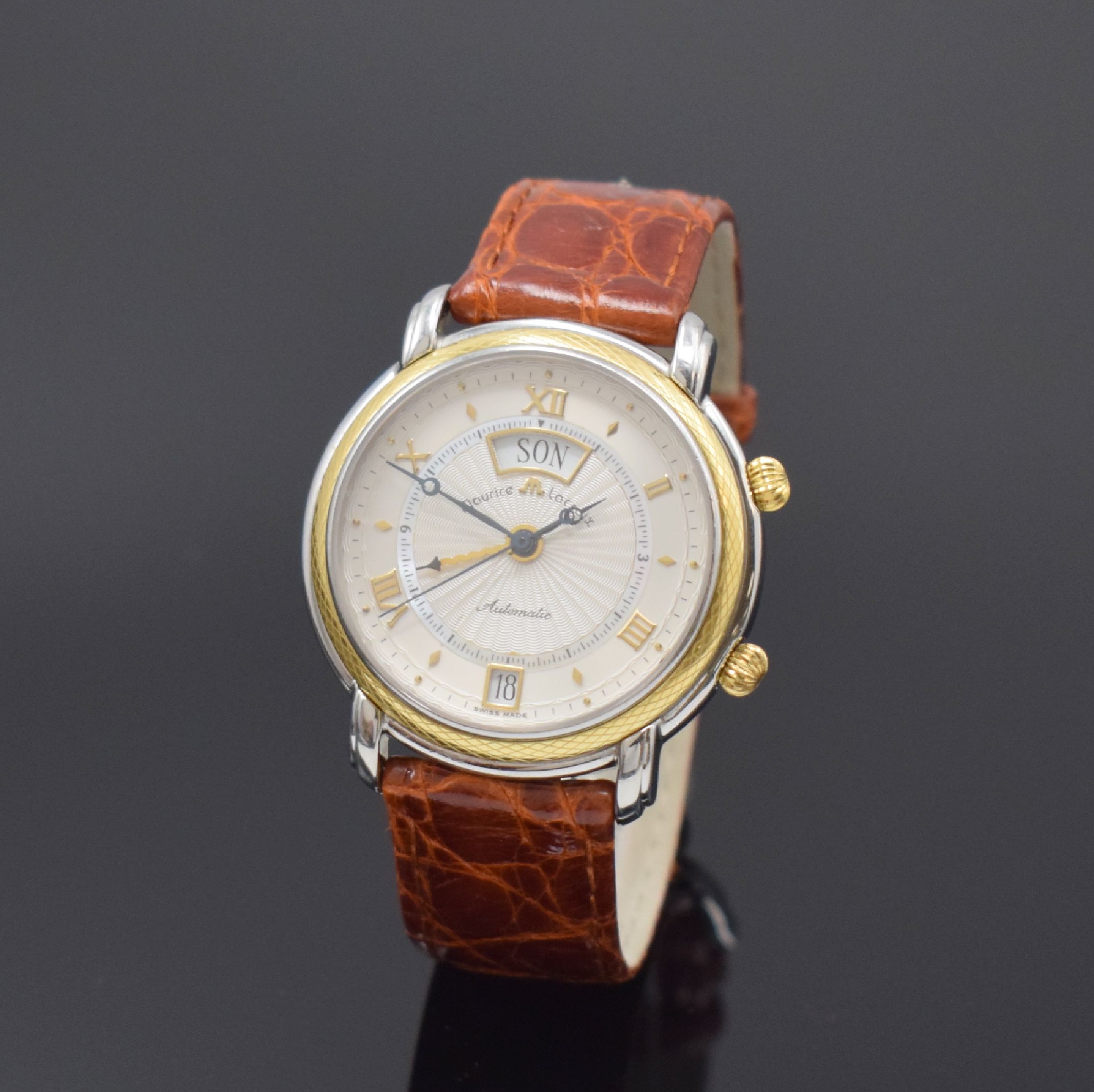 MAURICE LACROIX Armbandwecker Referenz 20584, Schweiz um 2005, Automatik, Edelstahl/Gold komb., 3-teil. Gehäuse, Boden u. Glasrand aufgedr., silb. ...
