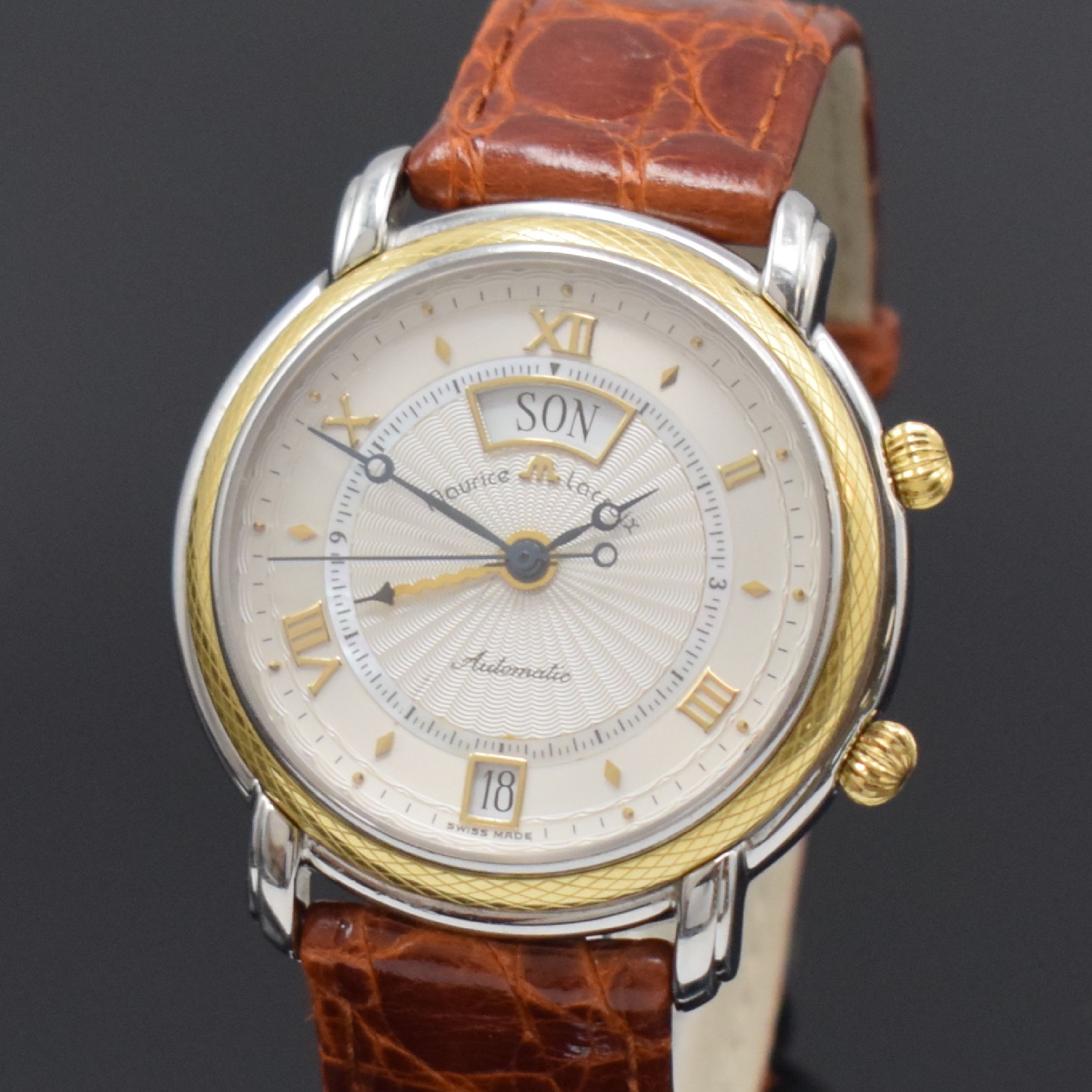 Detail a: MAURICE LACROIX Armbandwecker Referenz 20584, Schweiz um 2005, Automatik, Edelstahl/Gold komb., 3-teil. Gehäuse, Boden u. Glasrand aufgedr., silb. ...